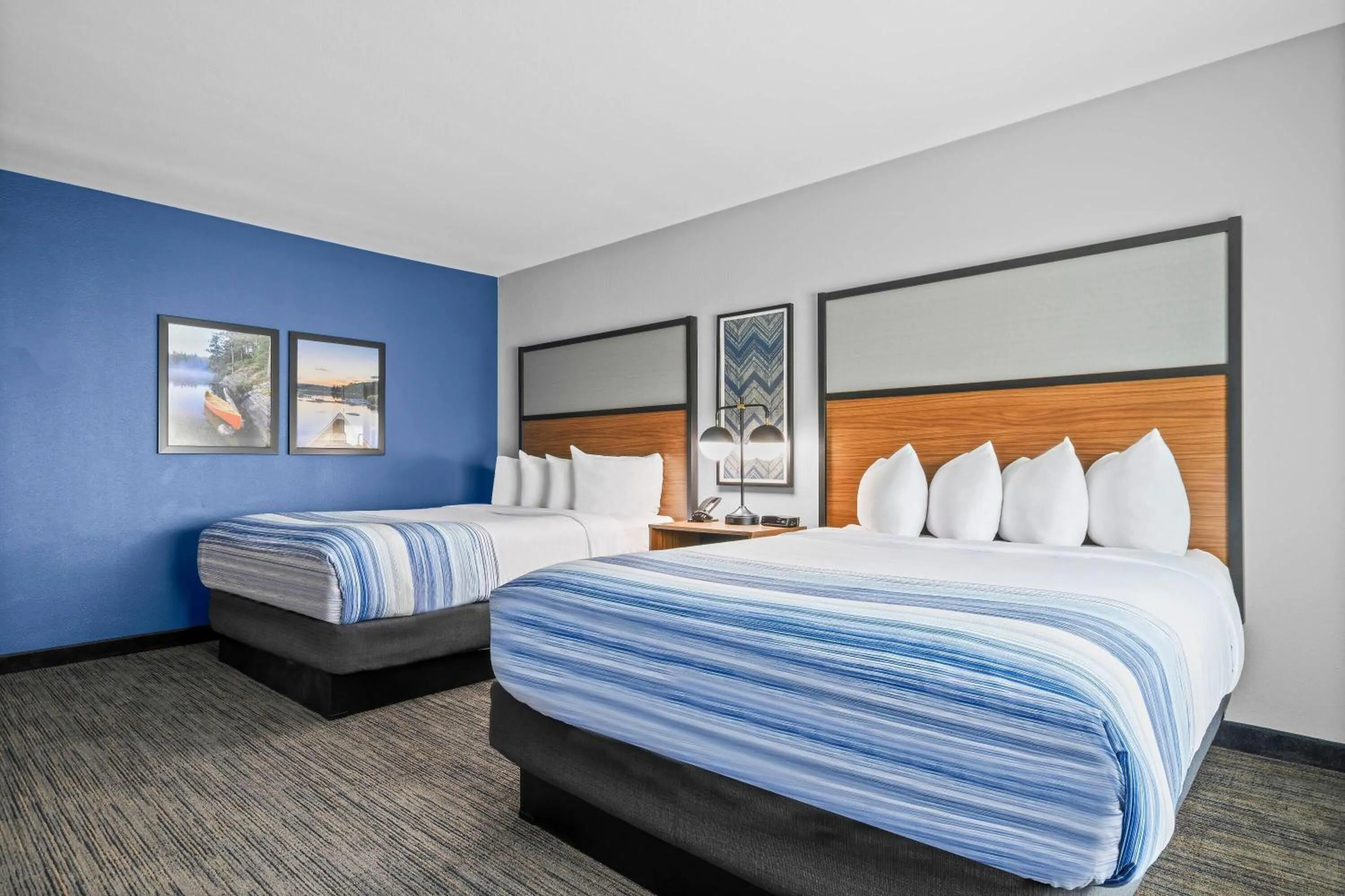 Photo of the whole room, Bed in AmericInn by Wyndham International Falls
