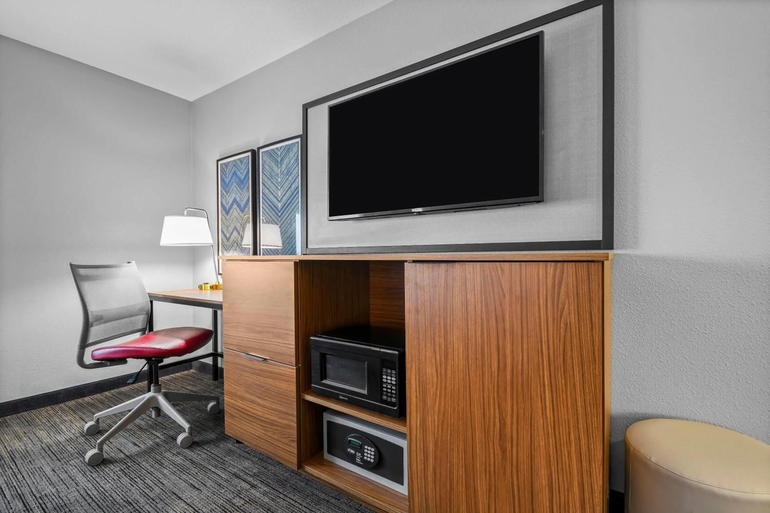 Bed in AmericInn by Wyndham International Falls