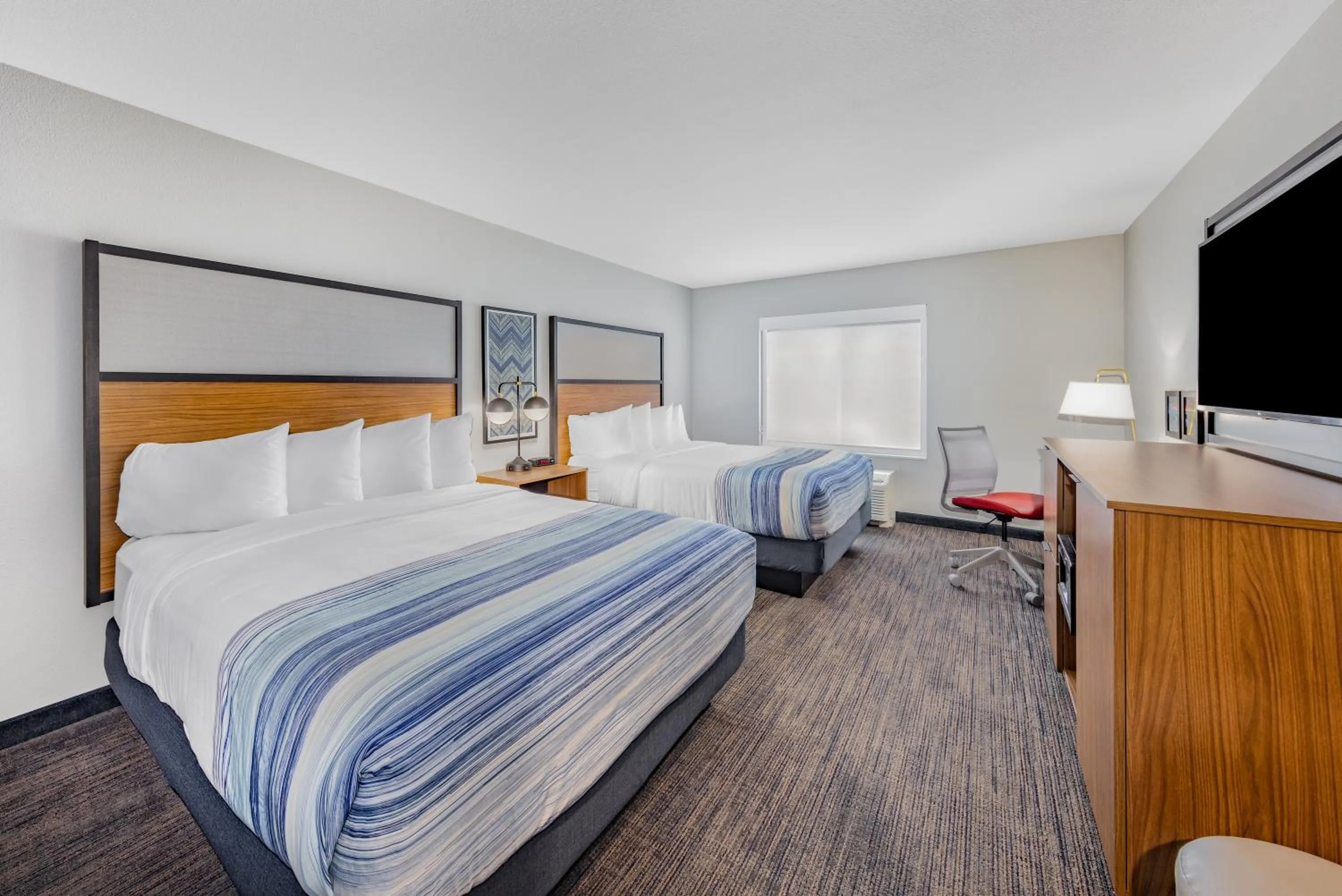Bedroom, Bed in AmericInn by Wyndham International Falls