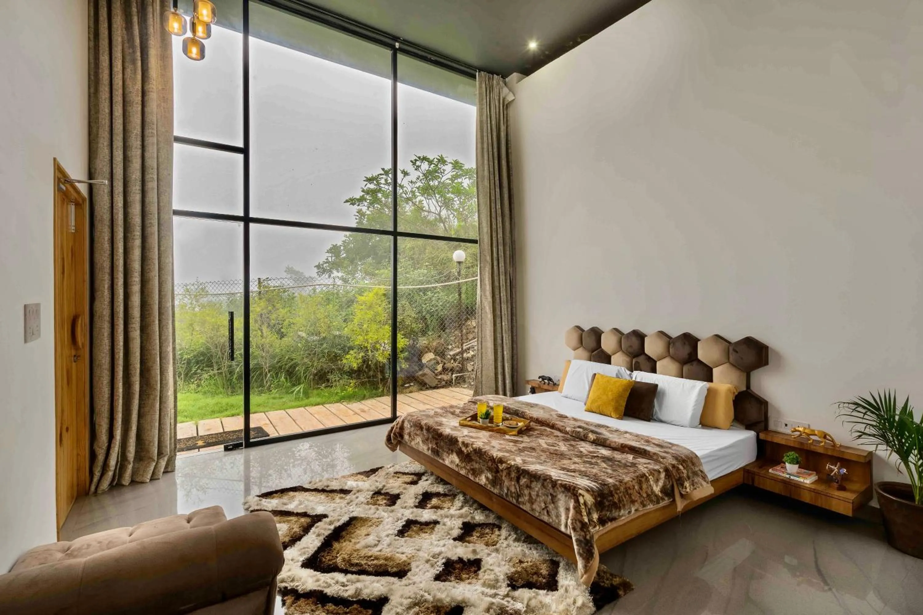 Bed in SaffronStays Glasshouse Celeste, Ranikhet - luxurious glass villa with breathtaking views