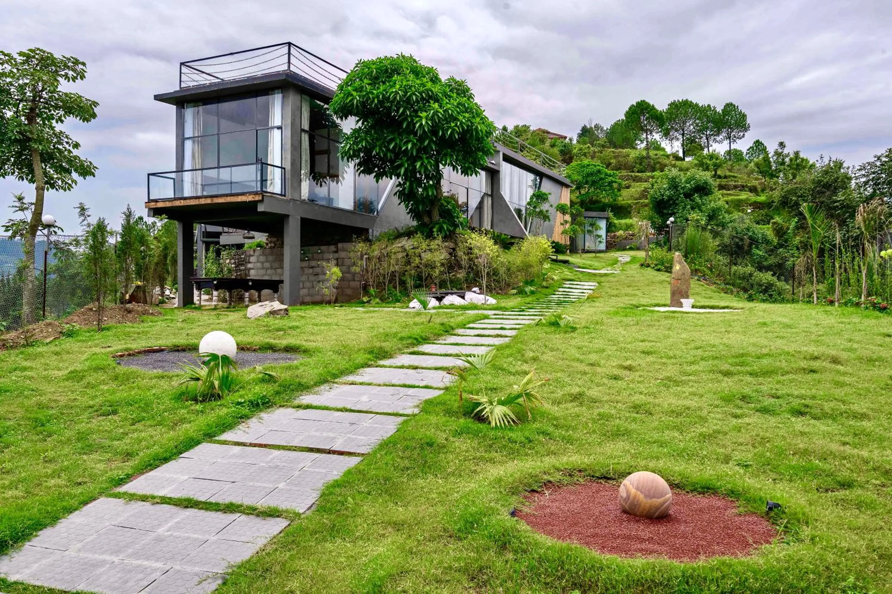 Property building in SaffronStays Glasshouse Celeste, Ranikhet - luxurious glass villa with breathtaking views