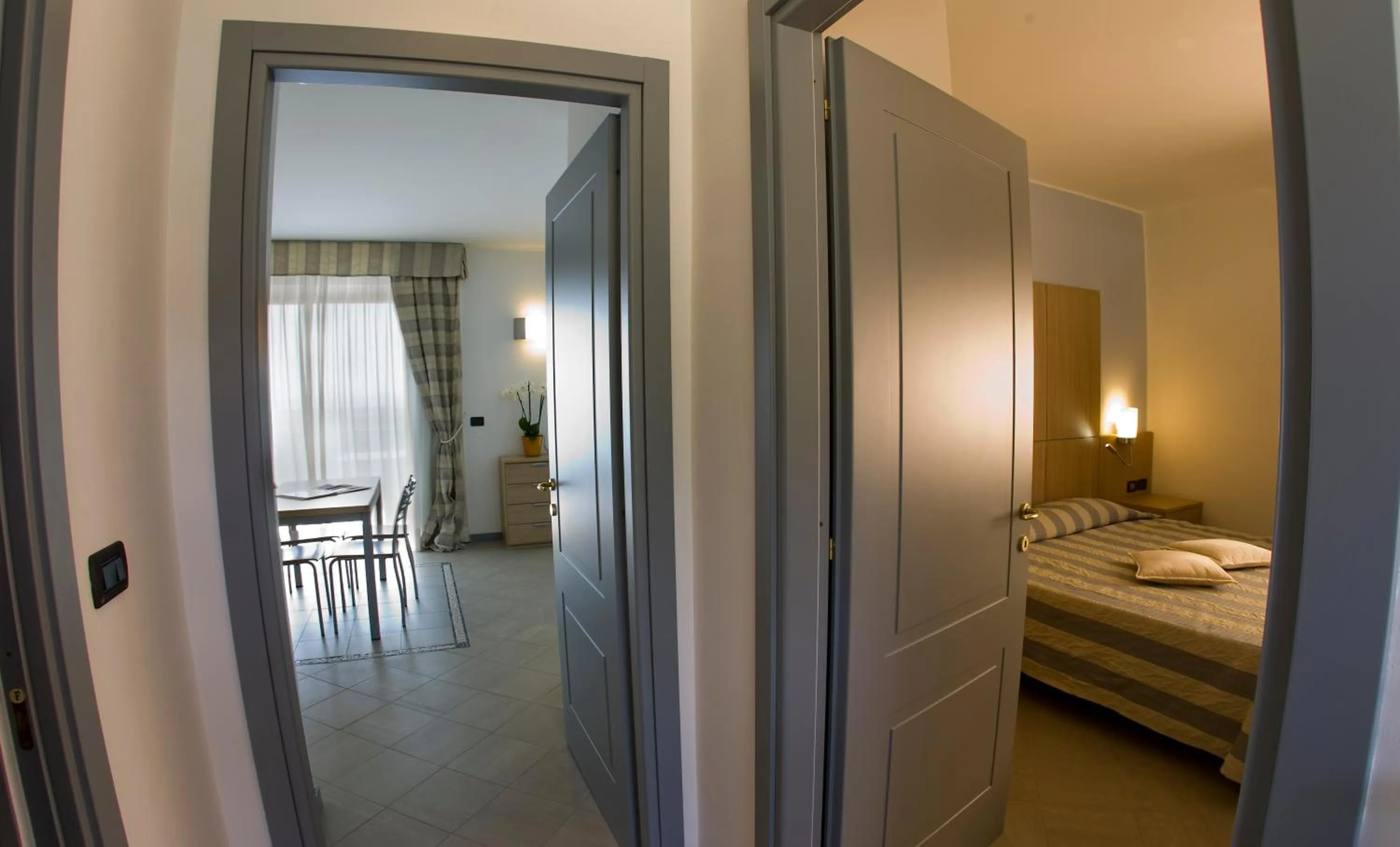 Living room, Bed in Aregai Marina Hotel & Residence