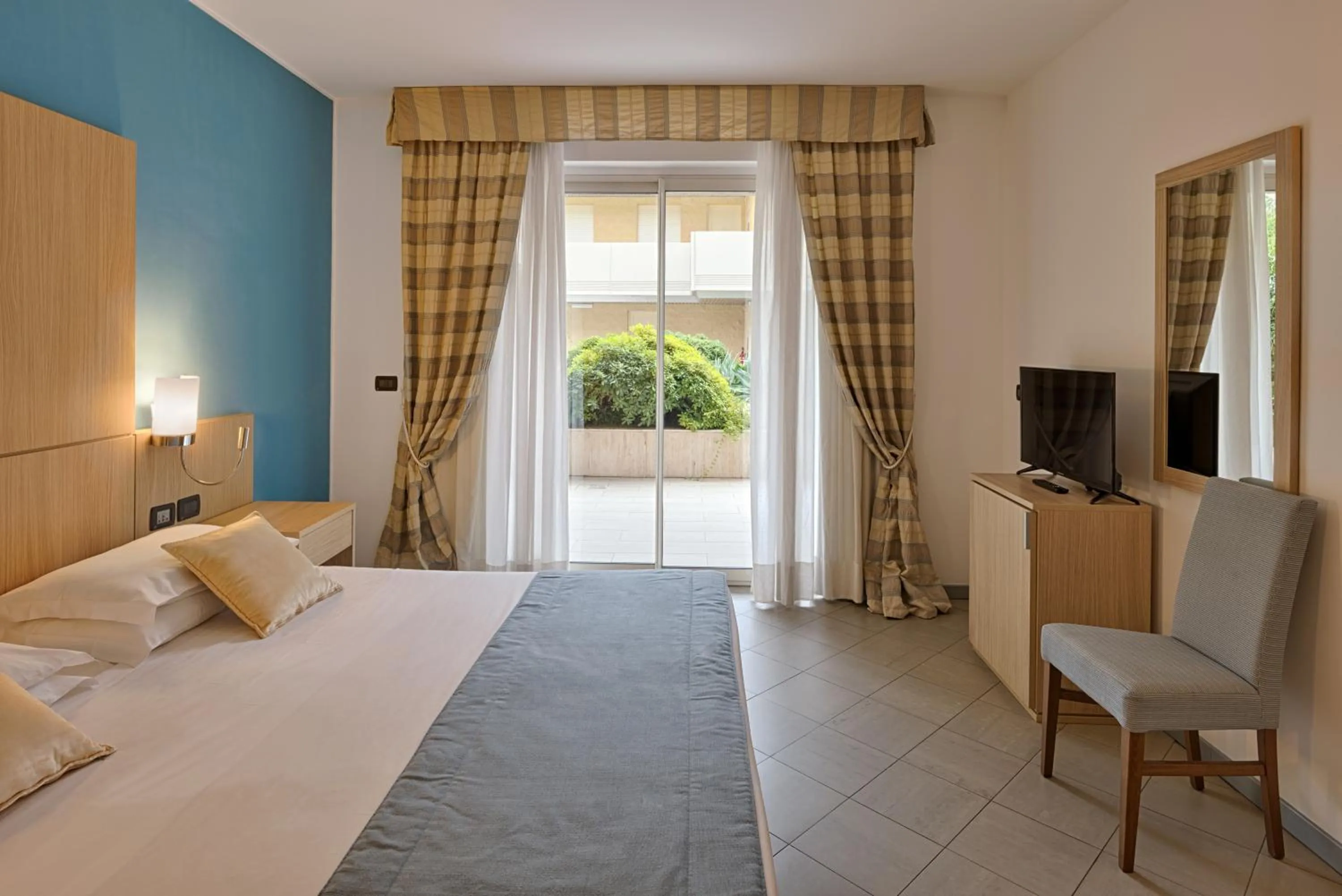 Bed in Aregai Marina Hotel & Residence