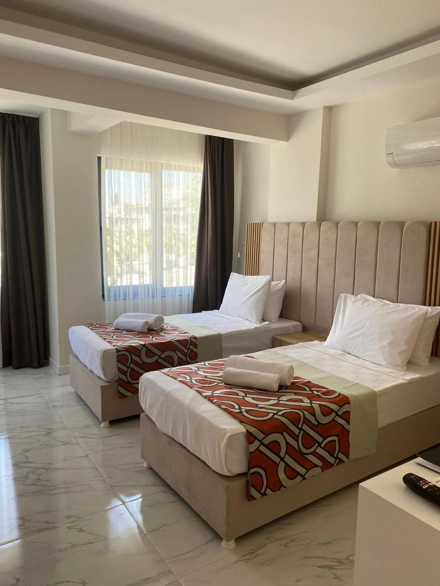 Bed in Optimum Luxury Hotel&Spa