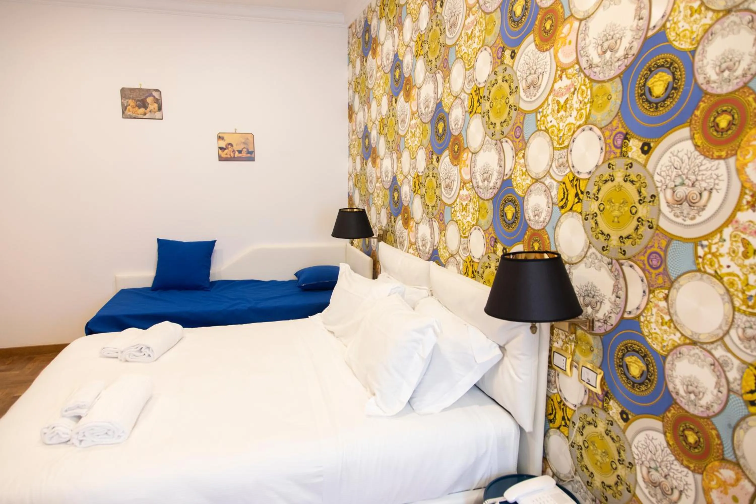 Bed in Hotel Cinquantatre