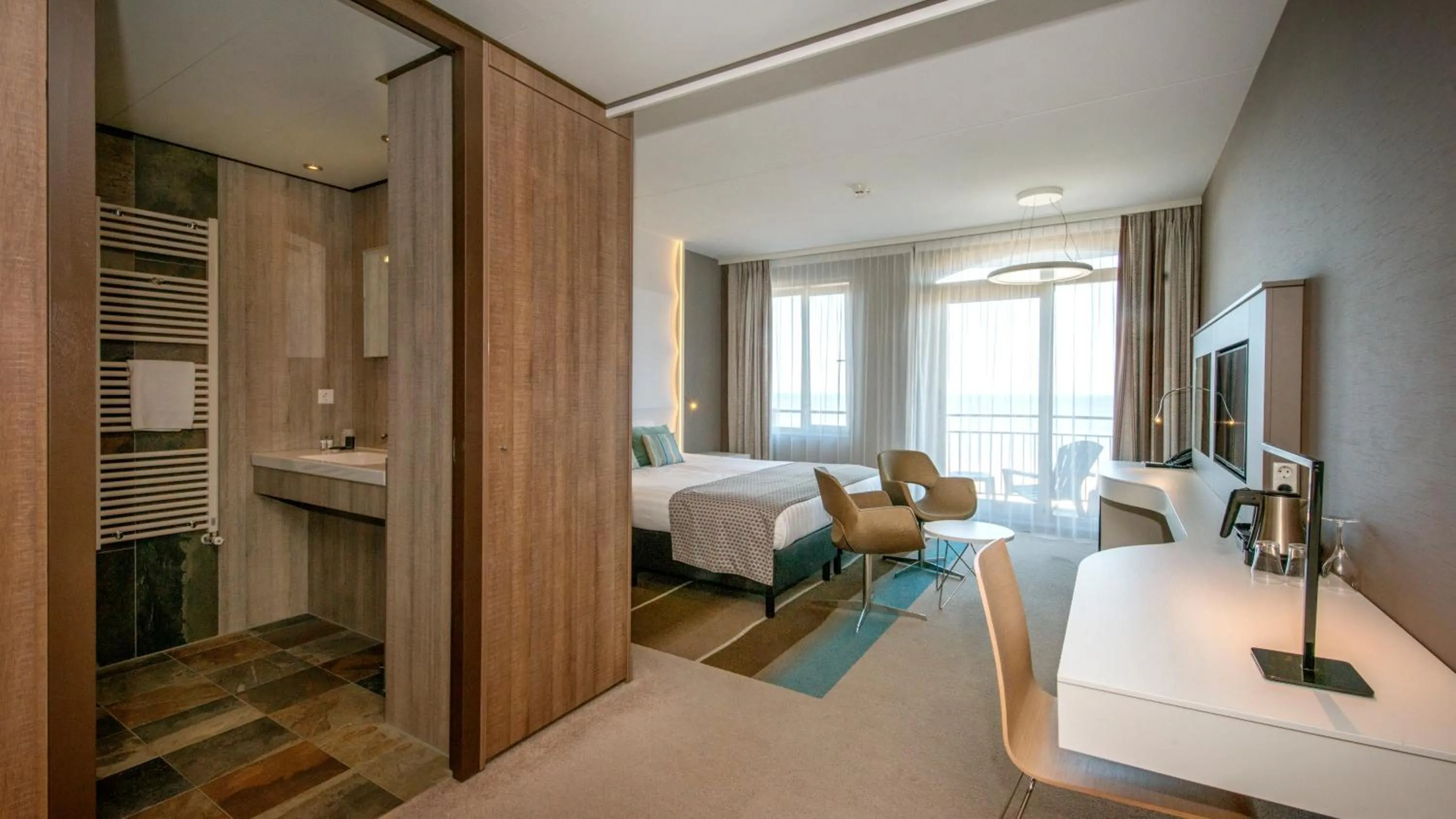 Bed in Strandhotel Golfzang