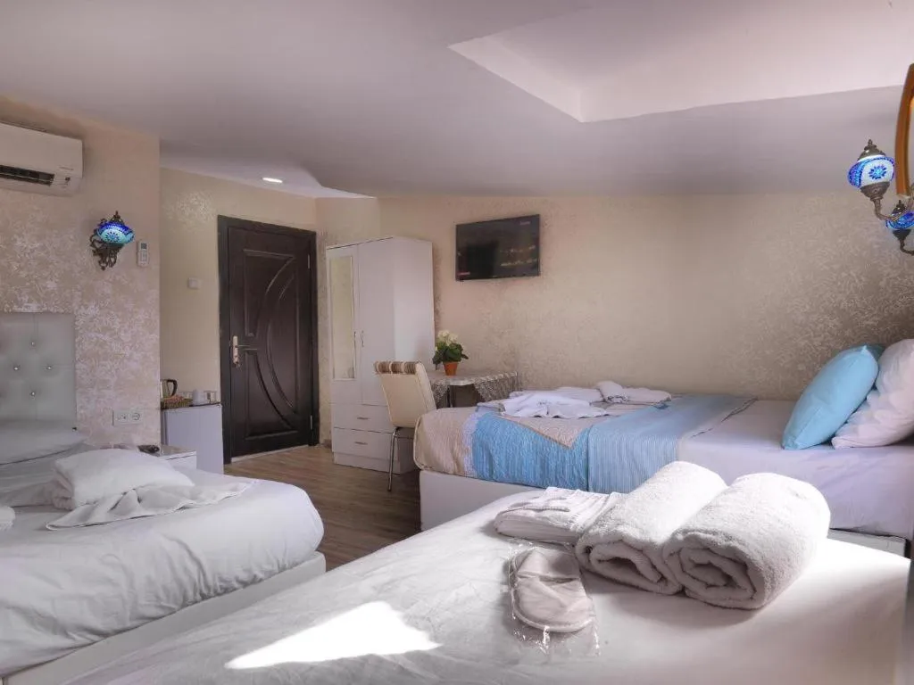 Bed in DİYAR BUDGET HOTEL