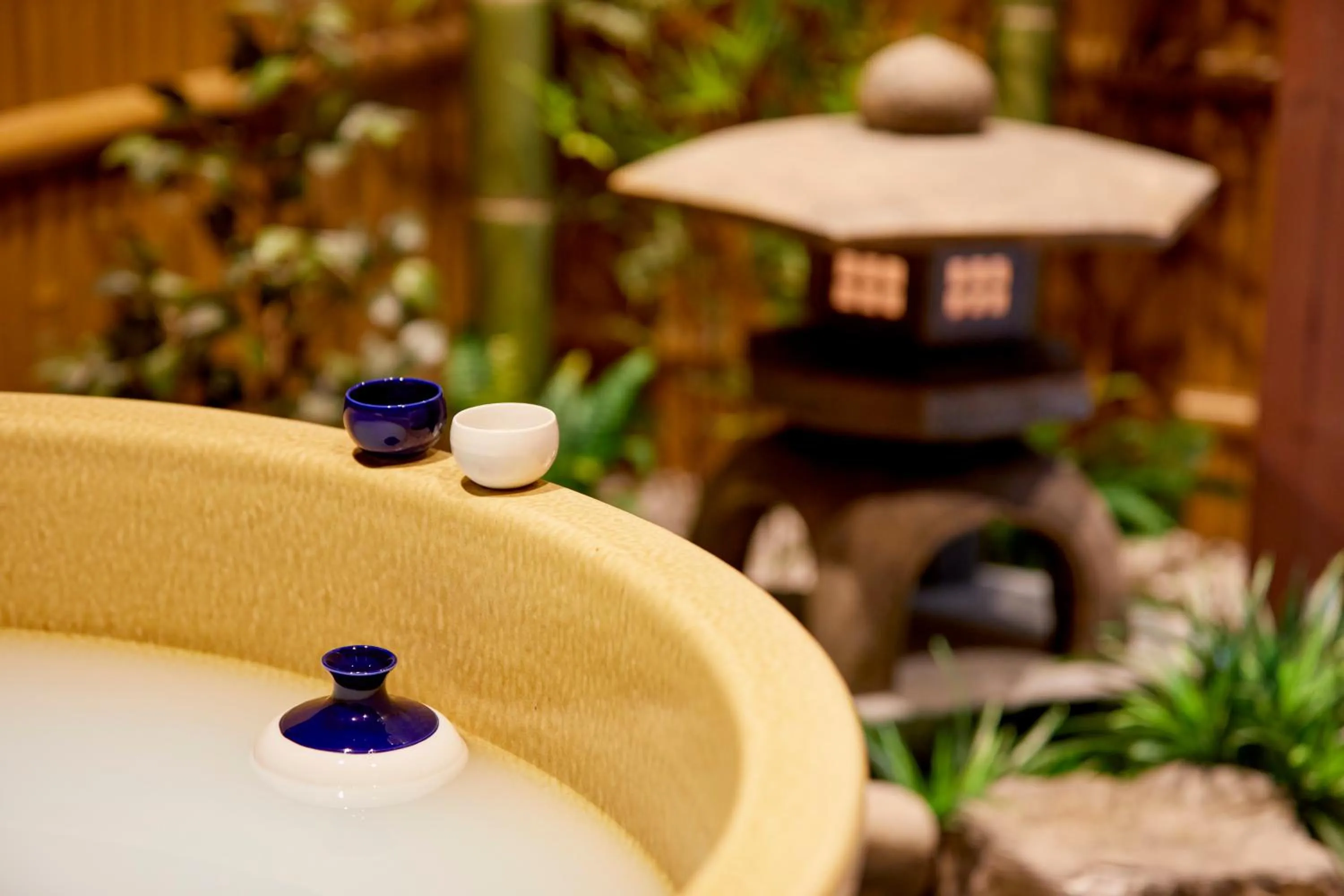 Hot Tub in 古今 天下茶屋 with a private parking lot and a half open-air bath and direct to KIX