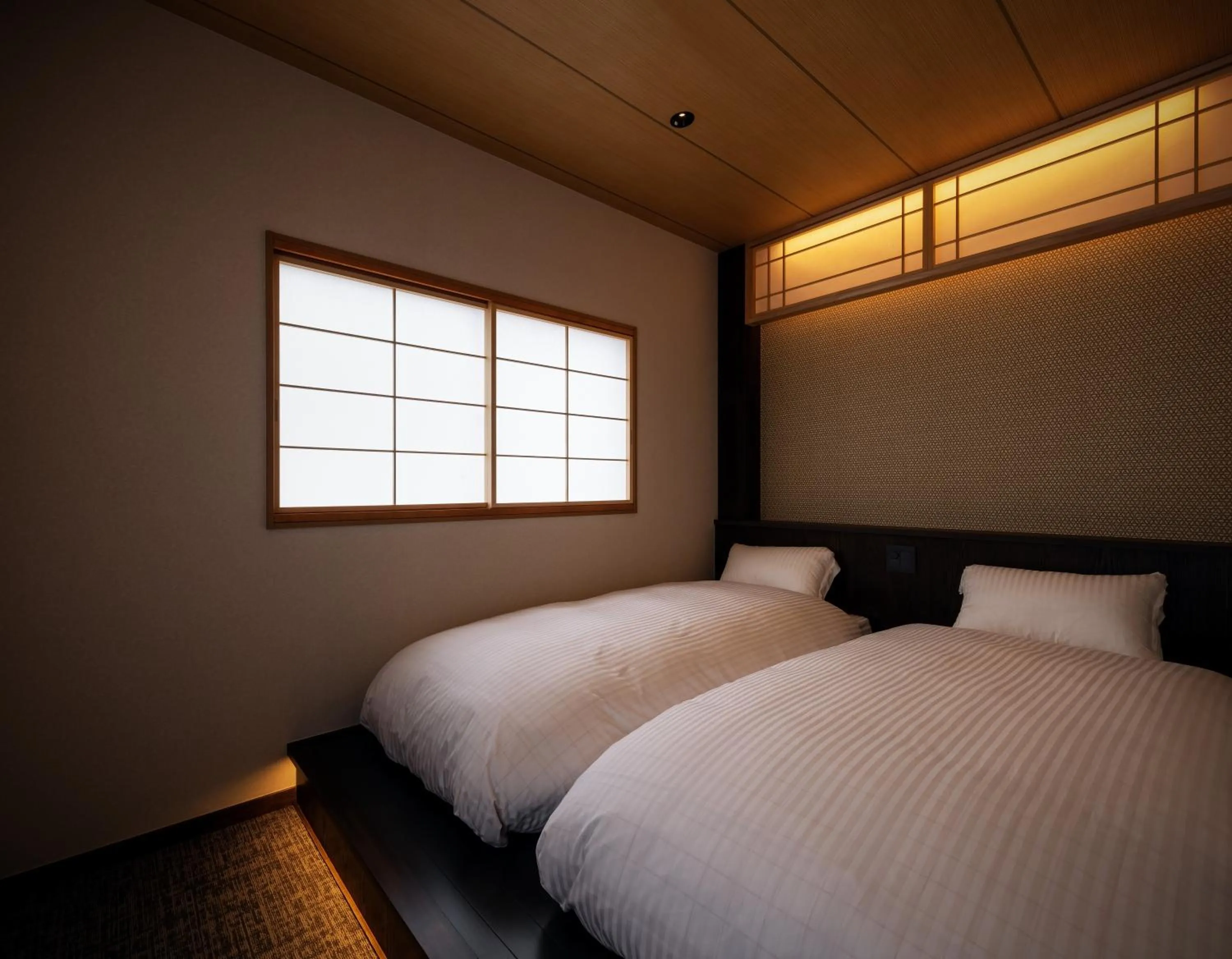 Bedroom, Bed in 古今 天下茶屋 with a private parking lot and a half open-air bath and direct to KIX