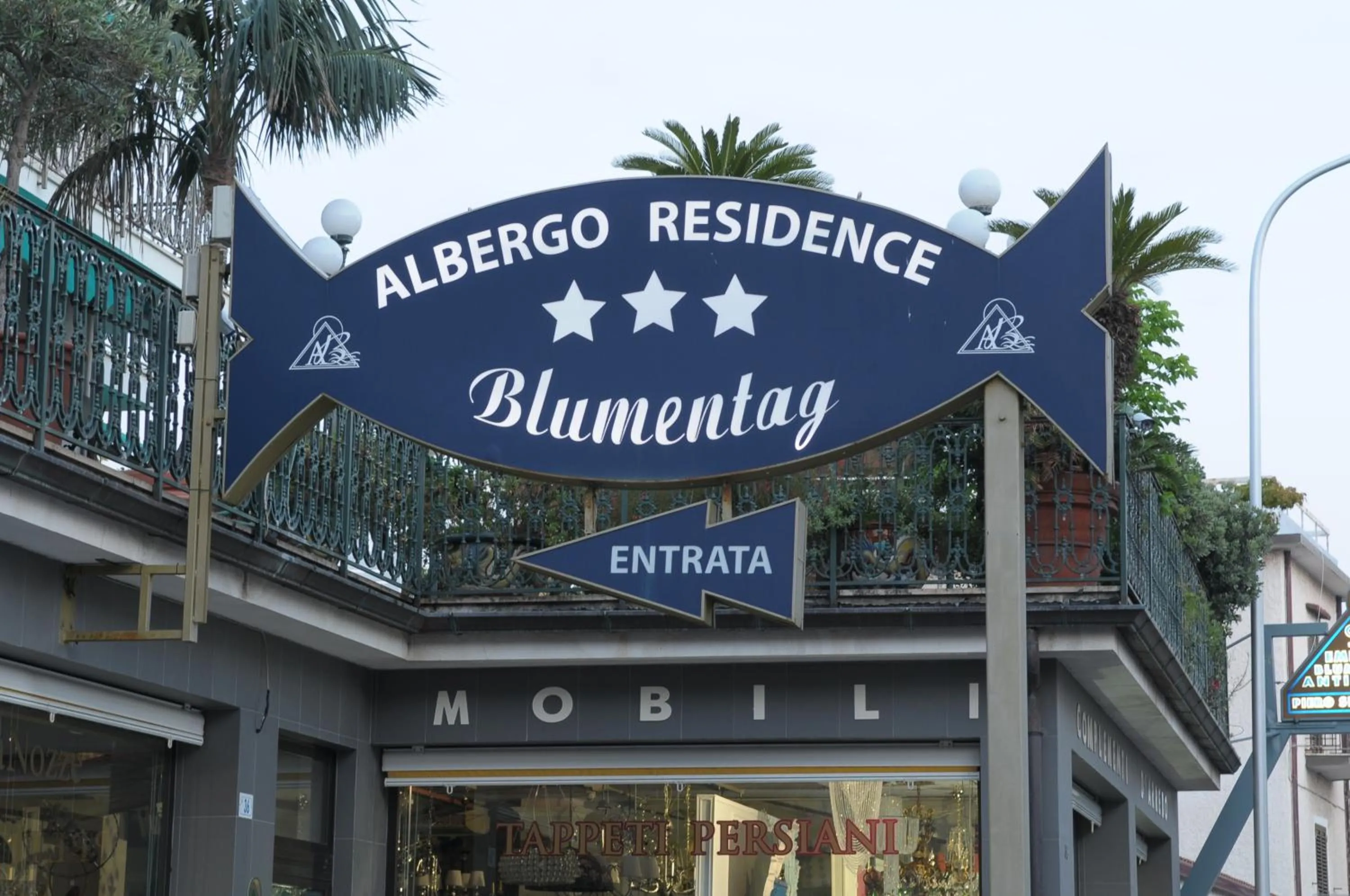 Property logo or sign in Hotel Blumentag