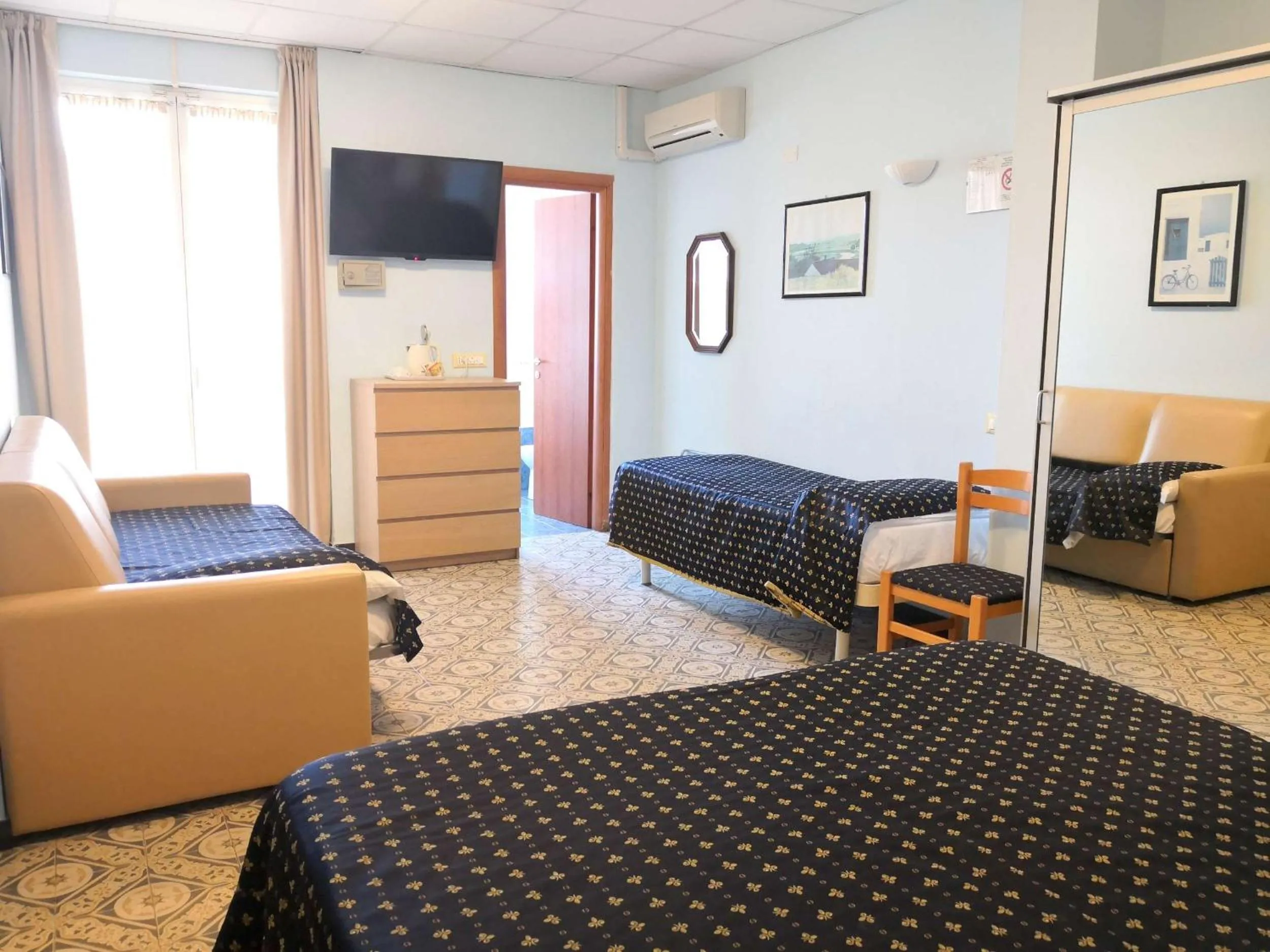 Bed in Hotel Delle Mimose