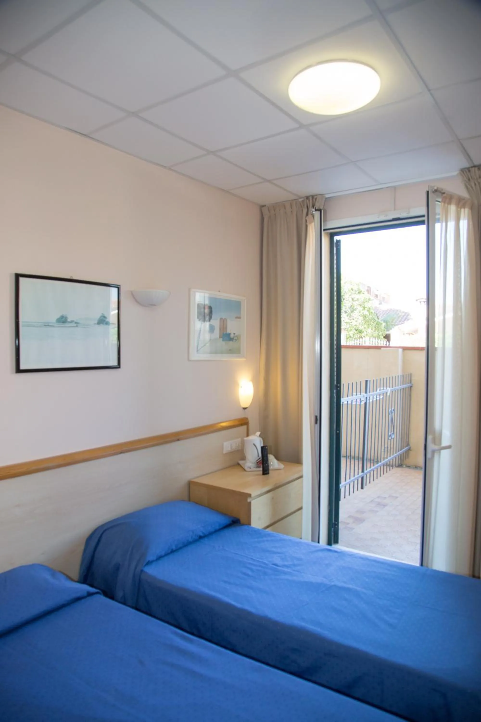 Bed in Hotel Delle Mimose