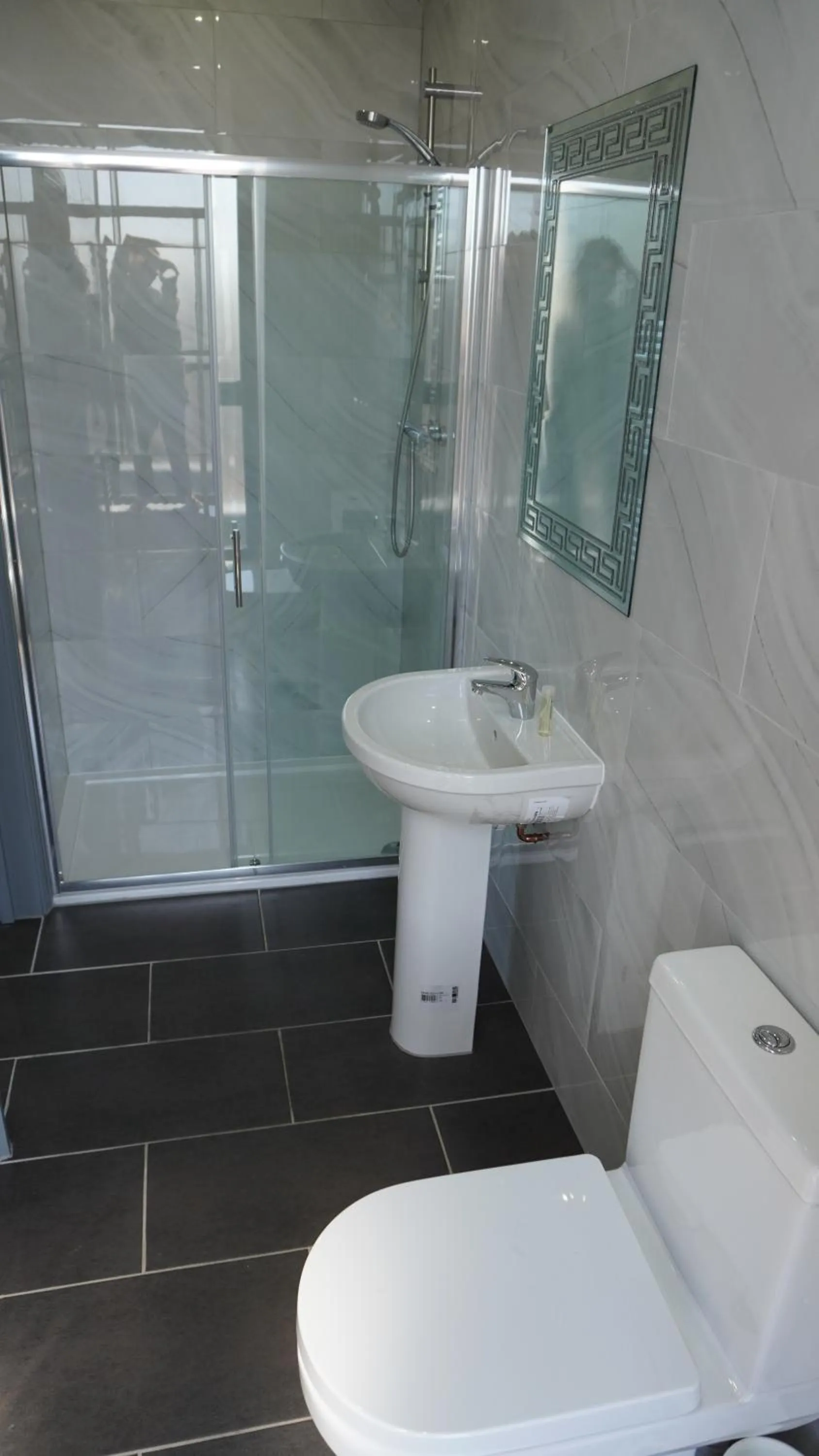 Bathroom in Roshni Hotel