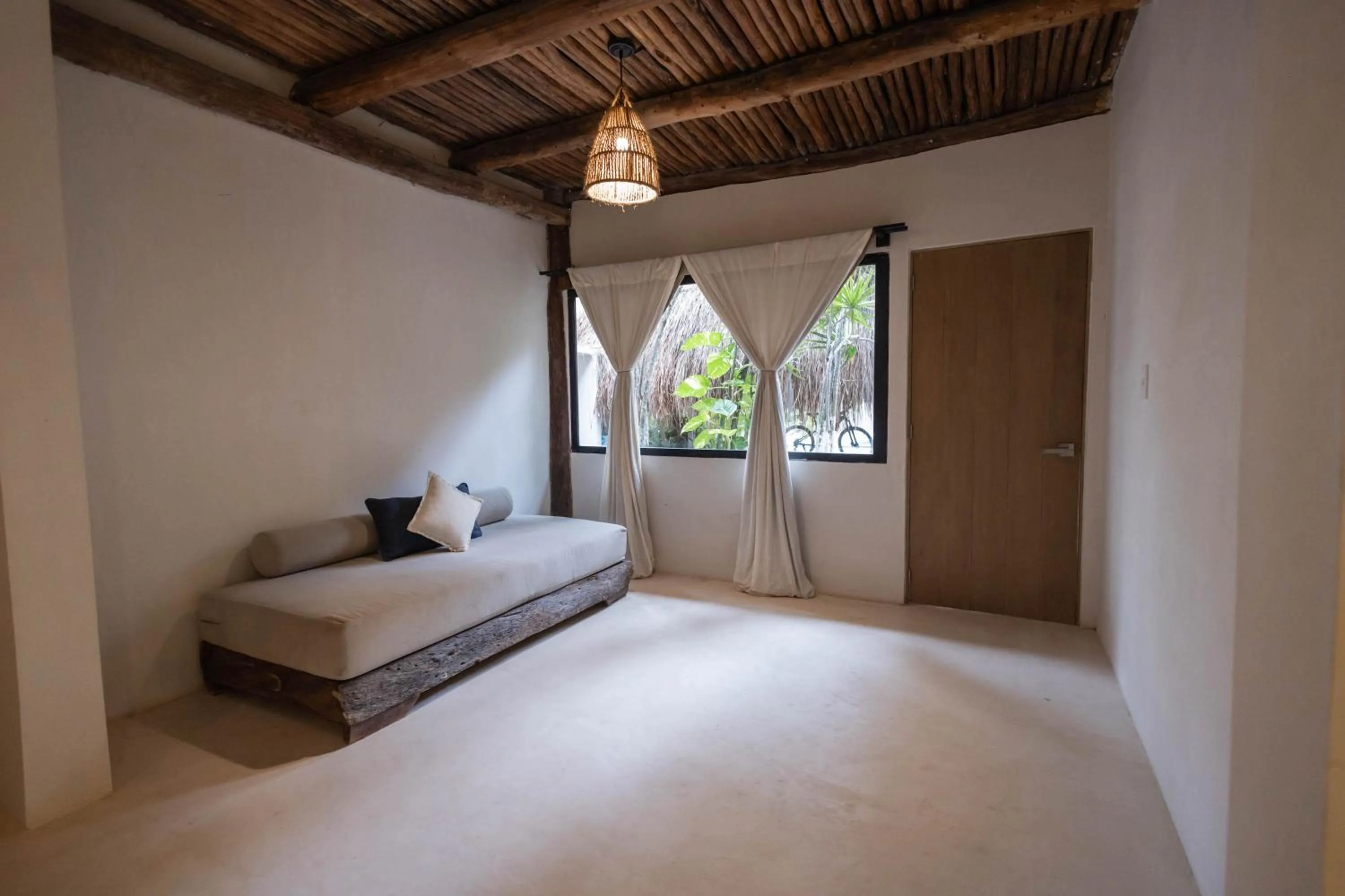 Seating area, Bed in Tuup Tulum