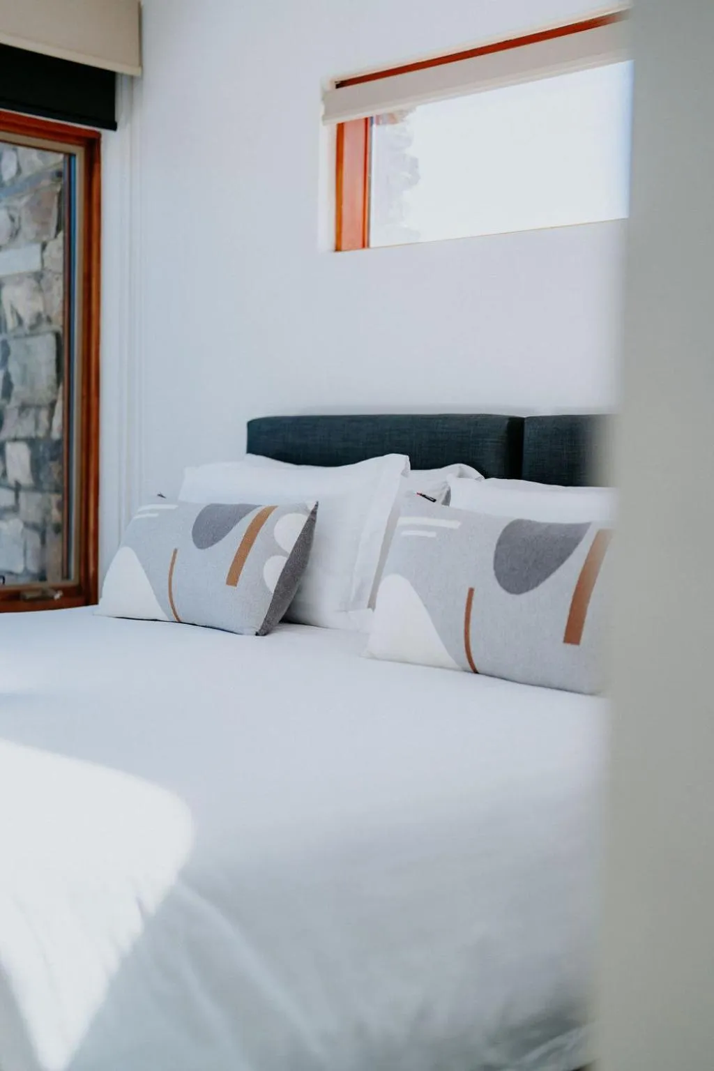 Bed in Alpine Woodsmoke Apartments