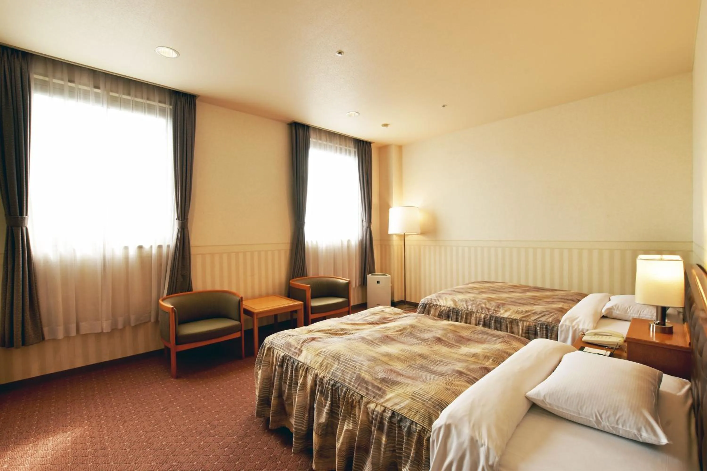 Photo of the whole room, Bed in Hotel Sapporo Sun Plaza