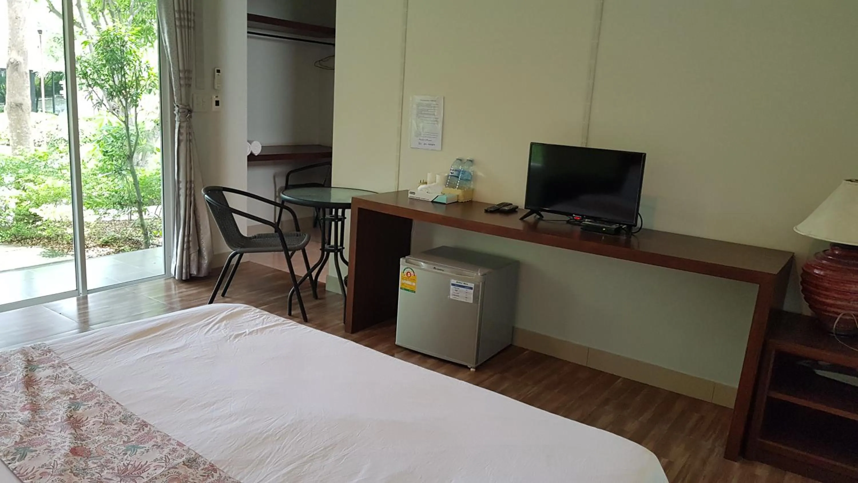 Bed in ที รีสอร์ท T Resort Suphanburi