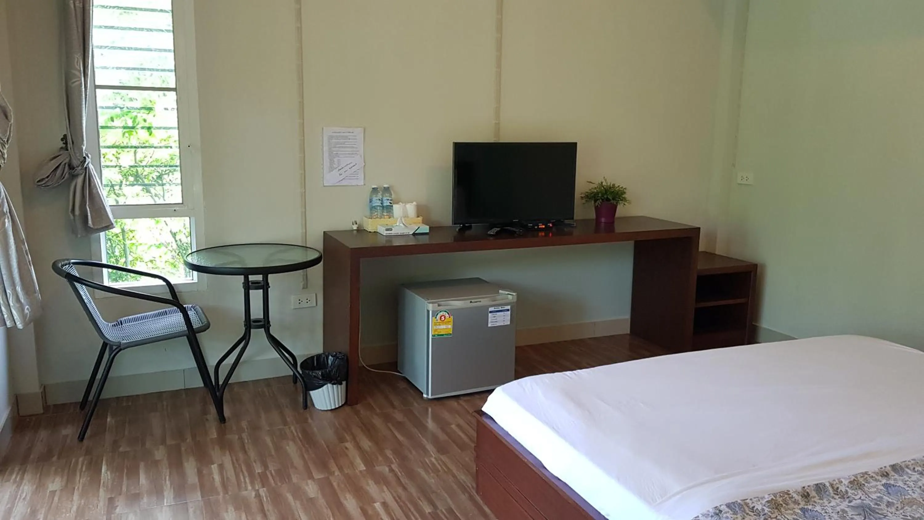 Bed in ที รีสอร์ท T Resort Suphanburi