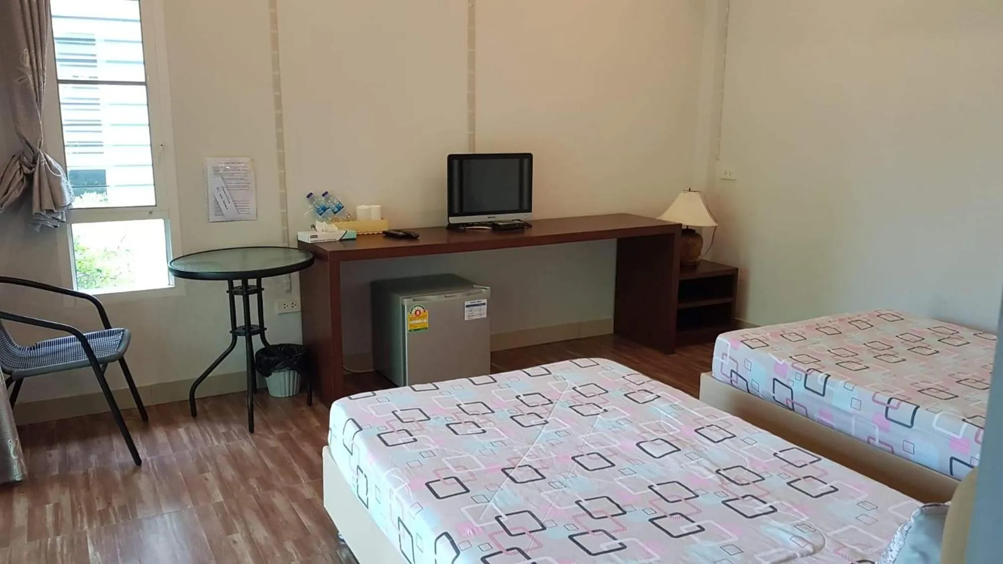 Bed in ที รีสอร์ท T Resort Suphanburi