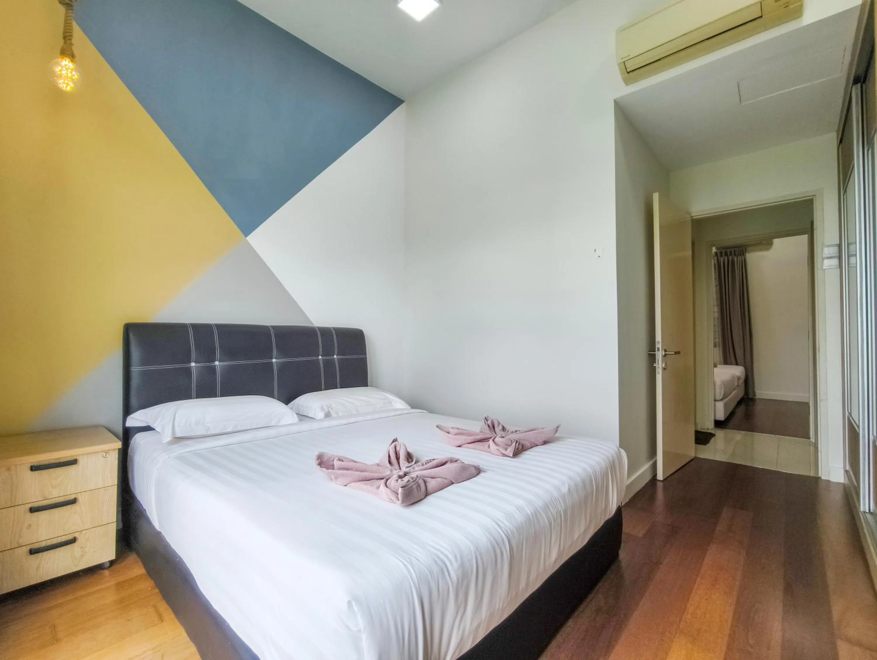 Bed in AJ Suites @ Loft Imago KK