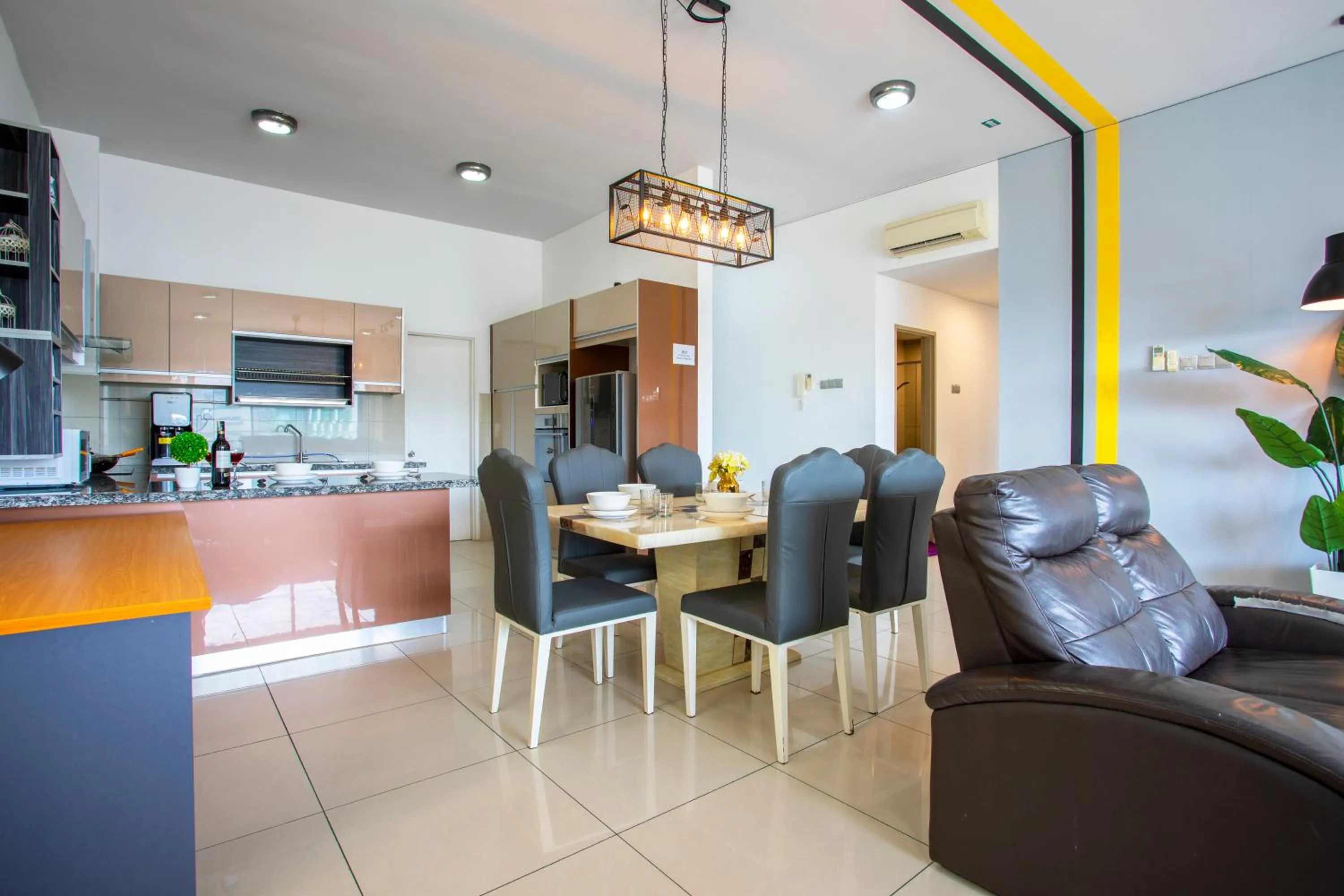 Dining area in AJ Suites @ Loft Imago KK