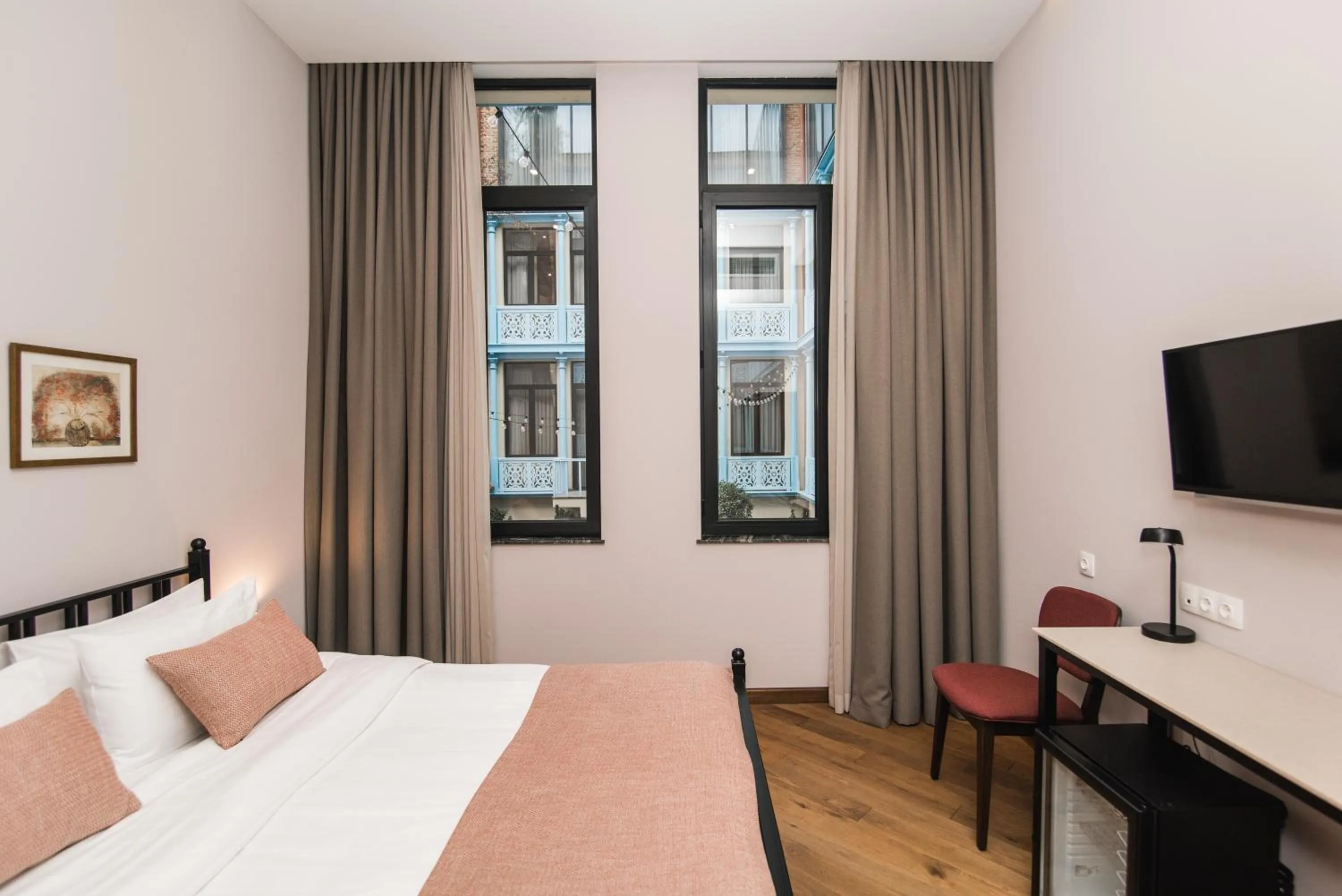 Photo of the whole room, Bed in Makmani Boutique Hotel by DNT Group