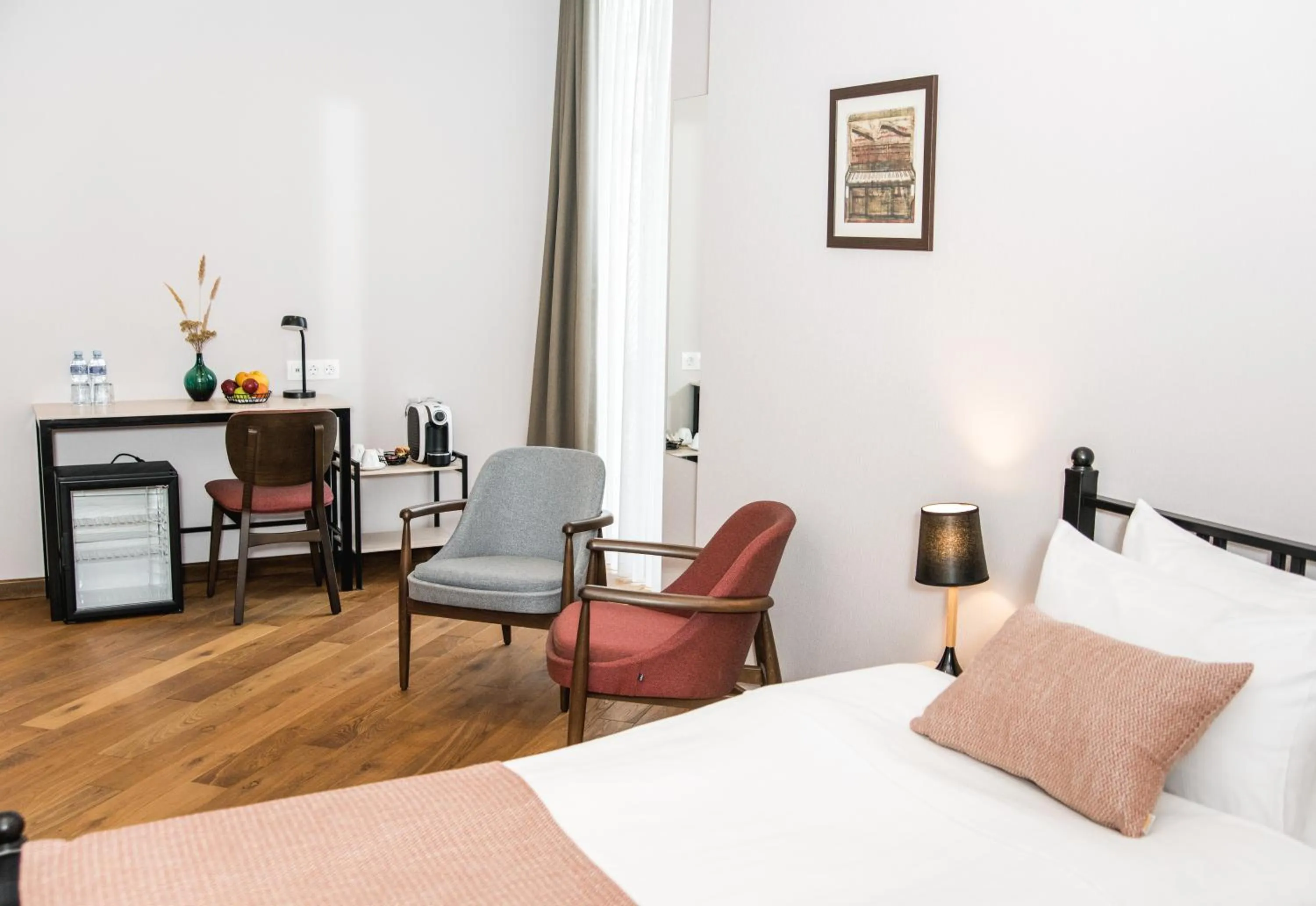 Photo of the whole room, Bed in Makmani Boutique Hotel by DNT Group