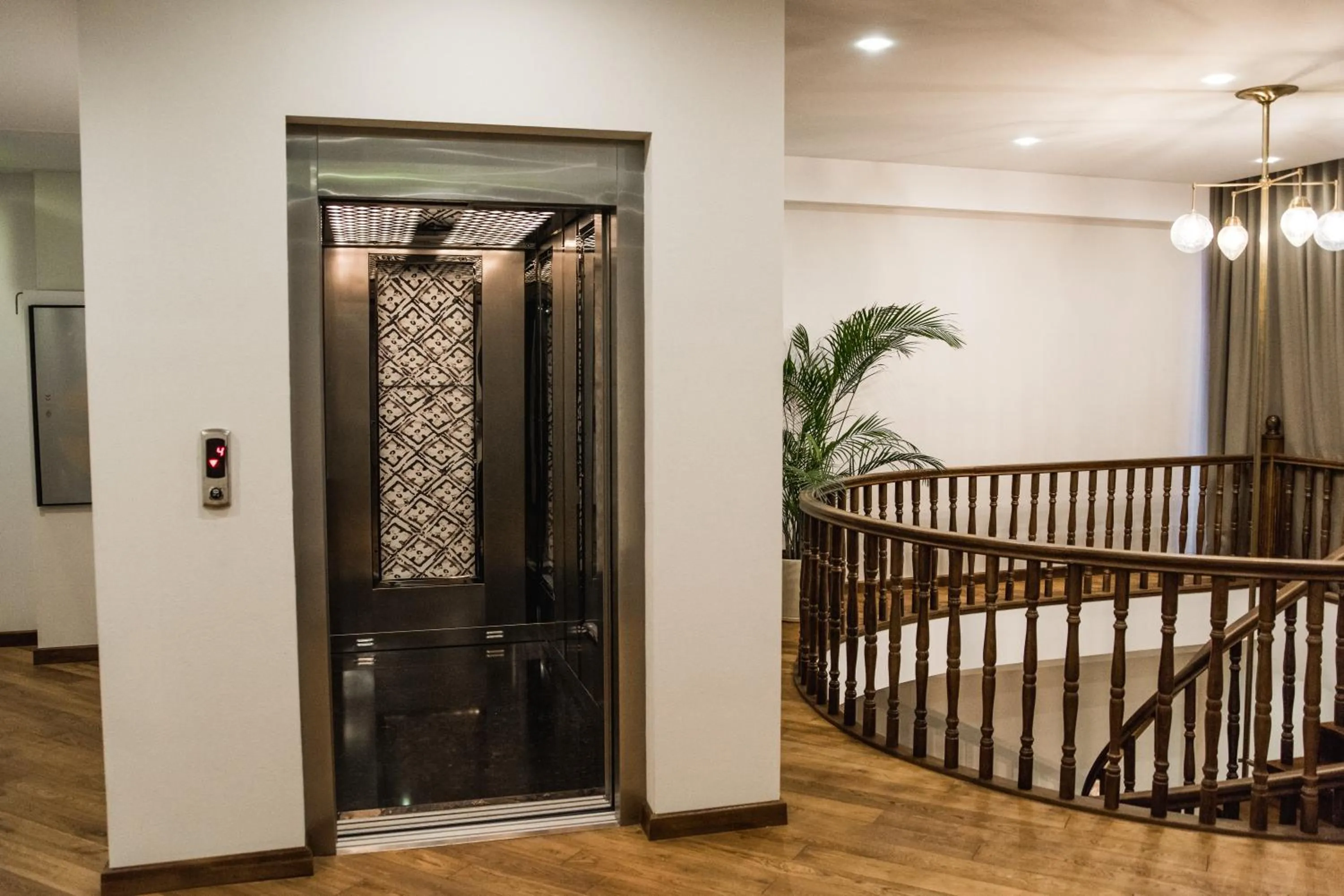 elevator, Bed in Makmani Boutique Hotel by DNT Group