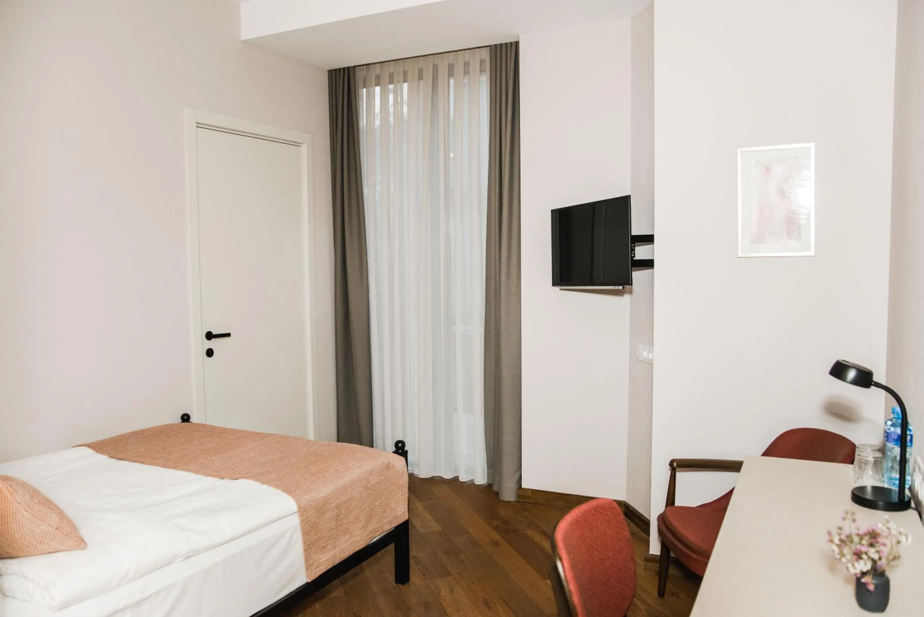 Photo of the whole room, Bed in Makmani Boutique Hotel by DNT Group