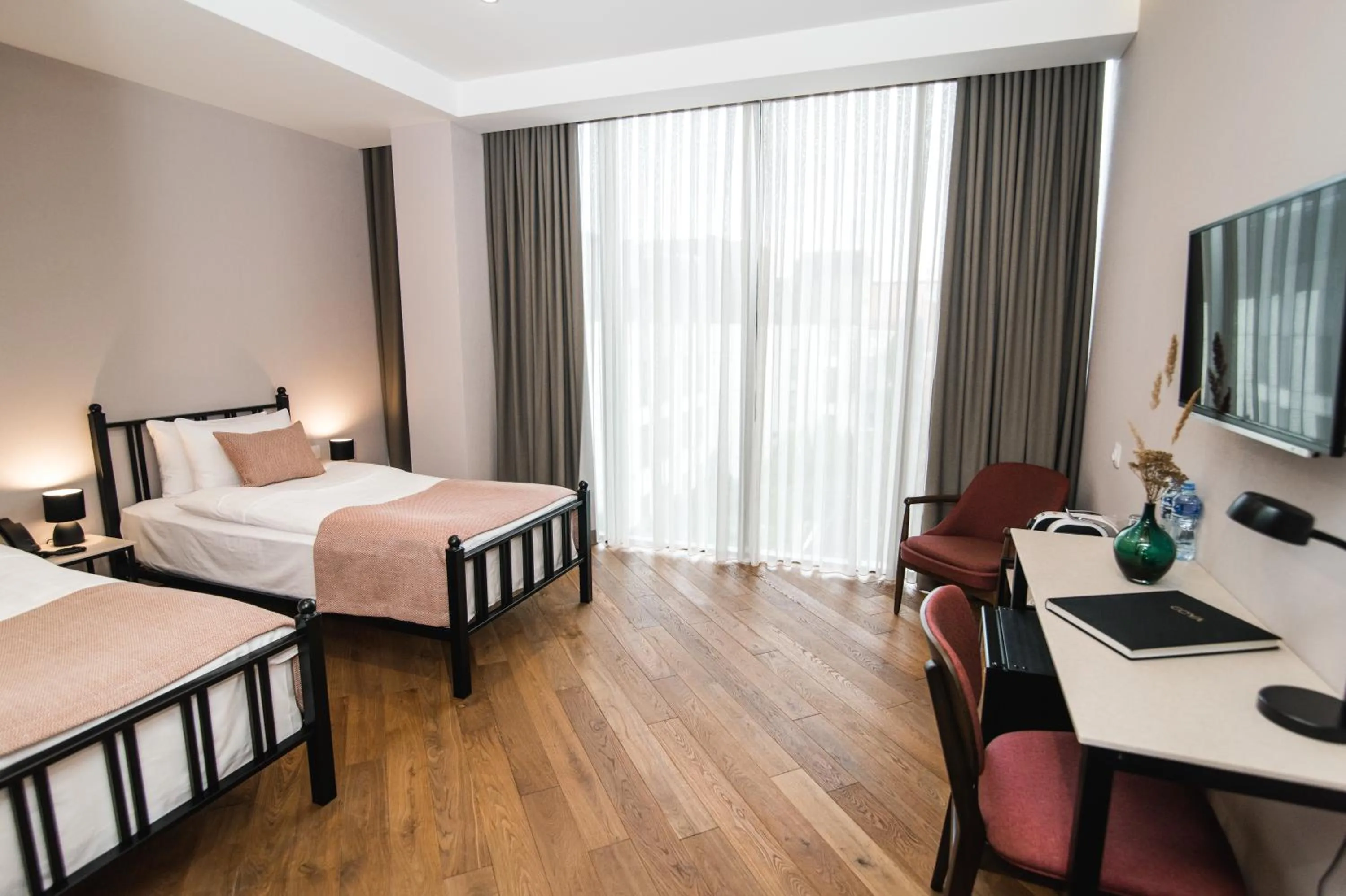 Bed in Makmani Boutique Hotel by DNT Group