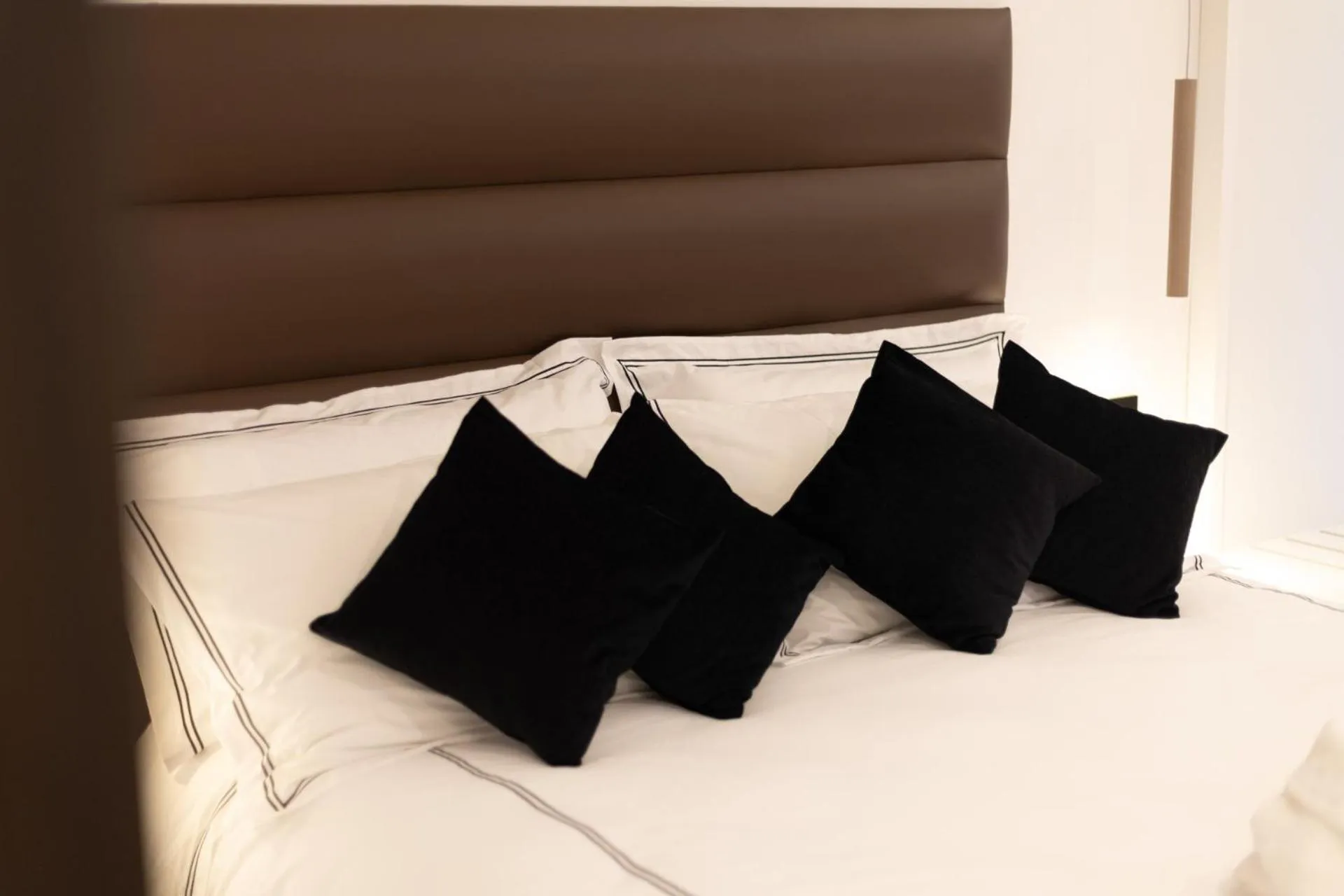 Bed in Popula Rooms & Mediterranean Bay