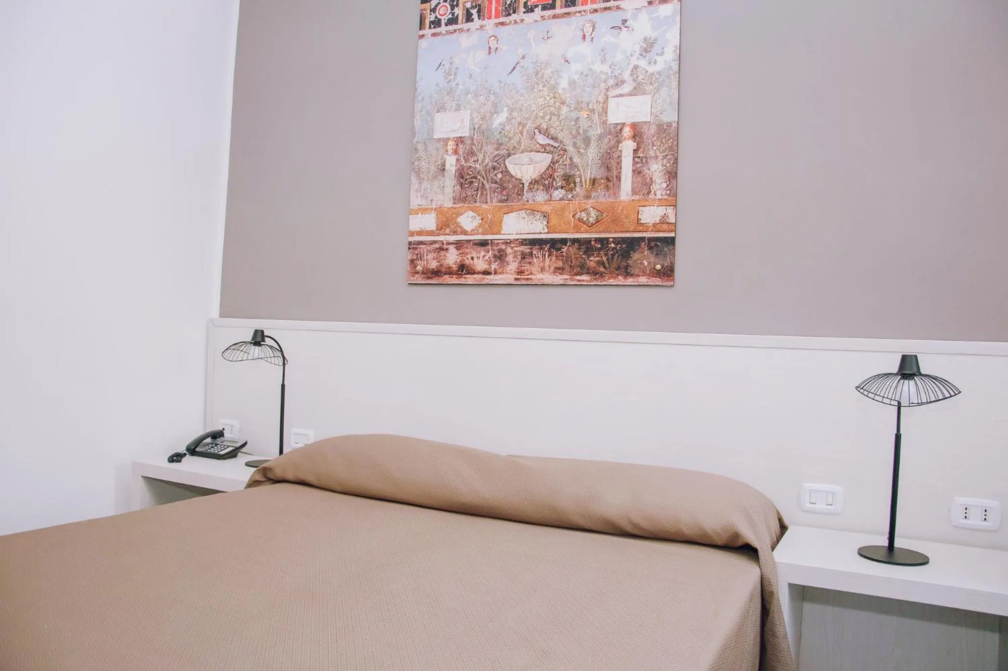 Bed in Hotel Piccolo Sogno