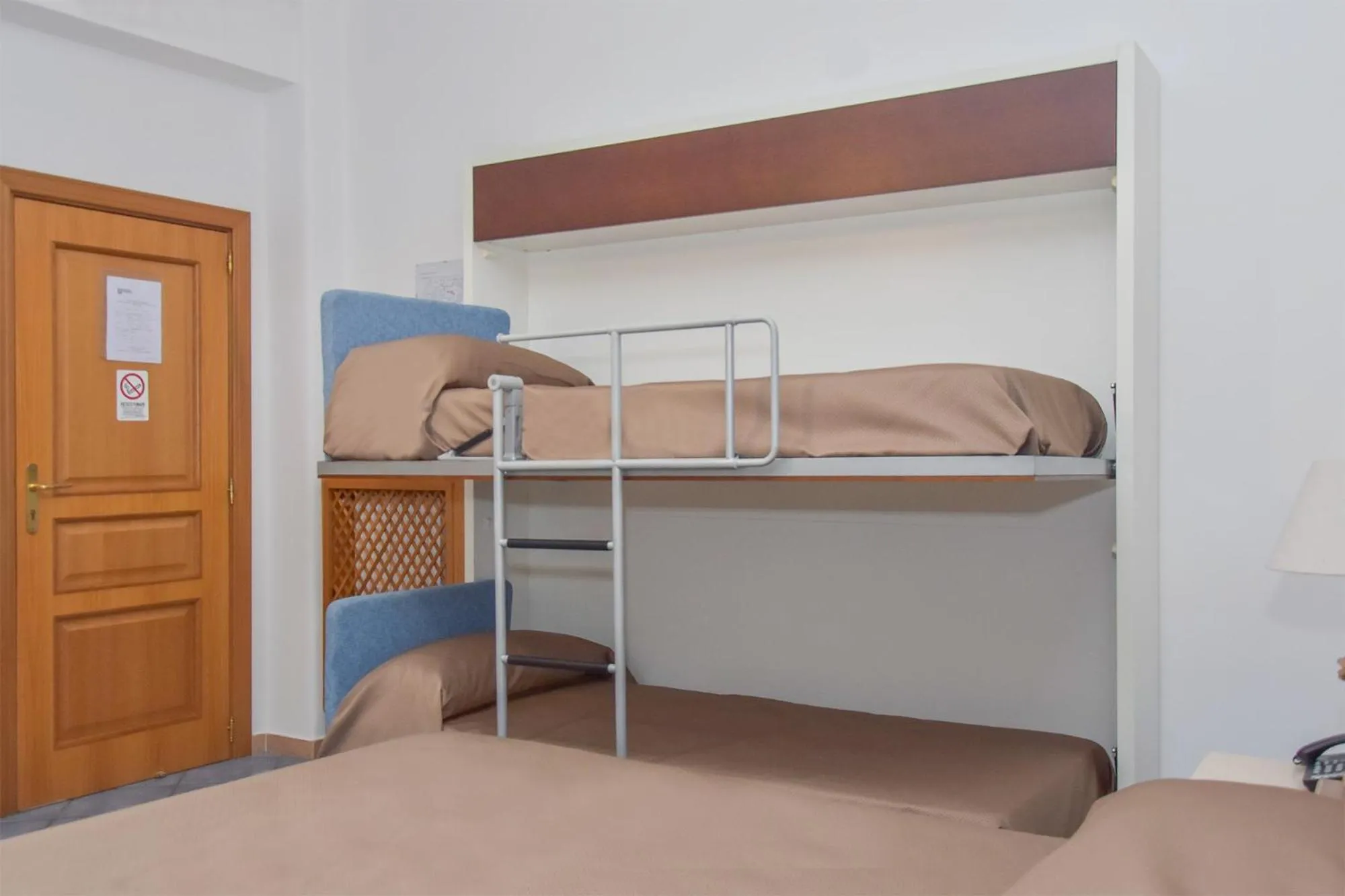 Bed in Hotel Piccolo Sogno