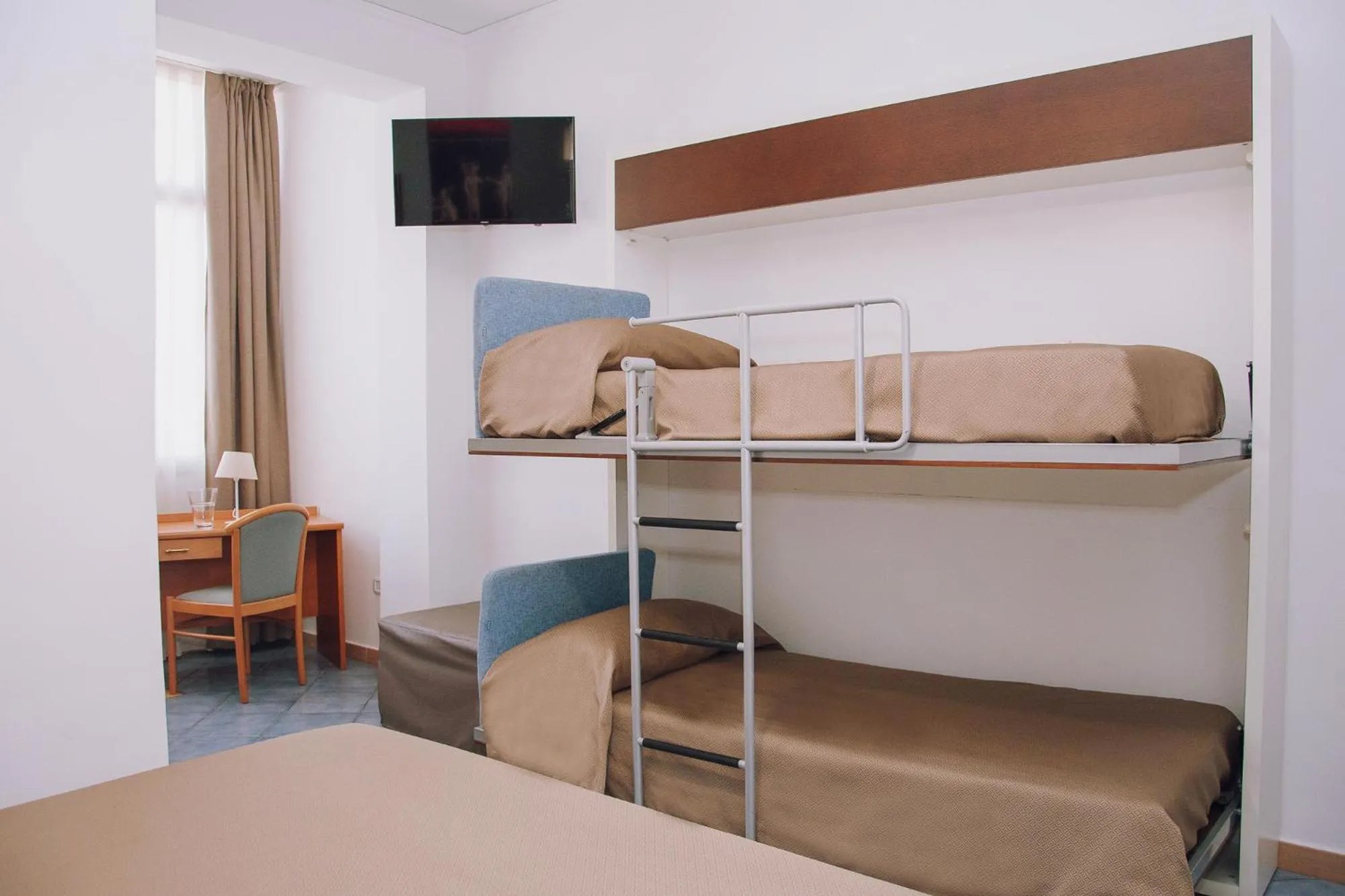 Bed in Hotel Piccolo Sogno