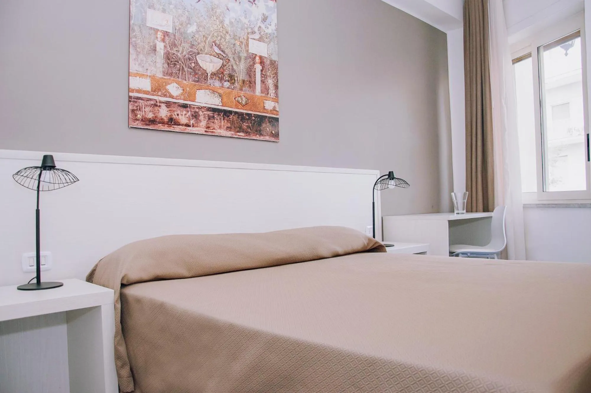 Bed in Hotel Piccolo Sogno