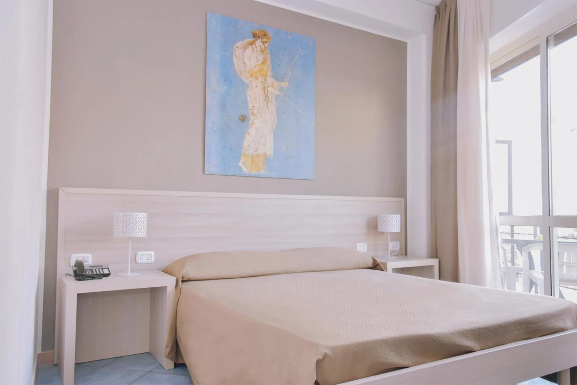 Bed in Hotel Piccolo Sogno