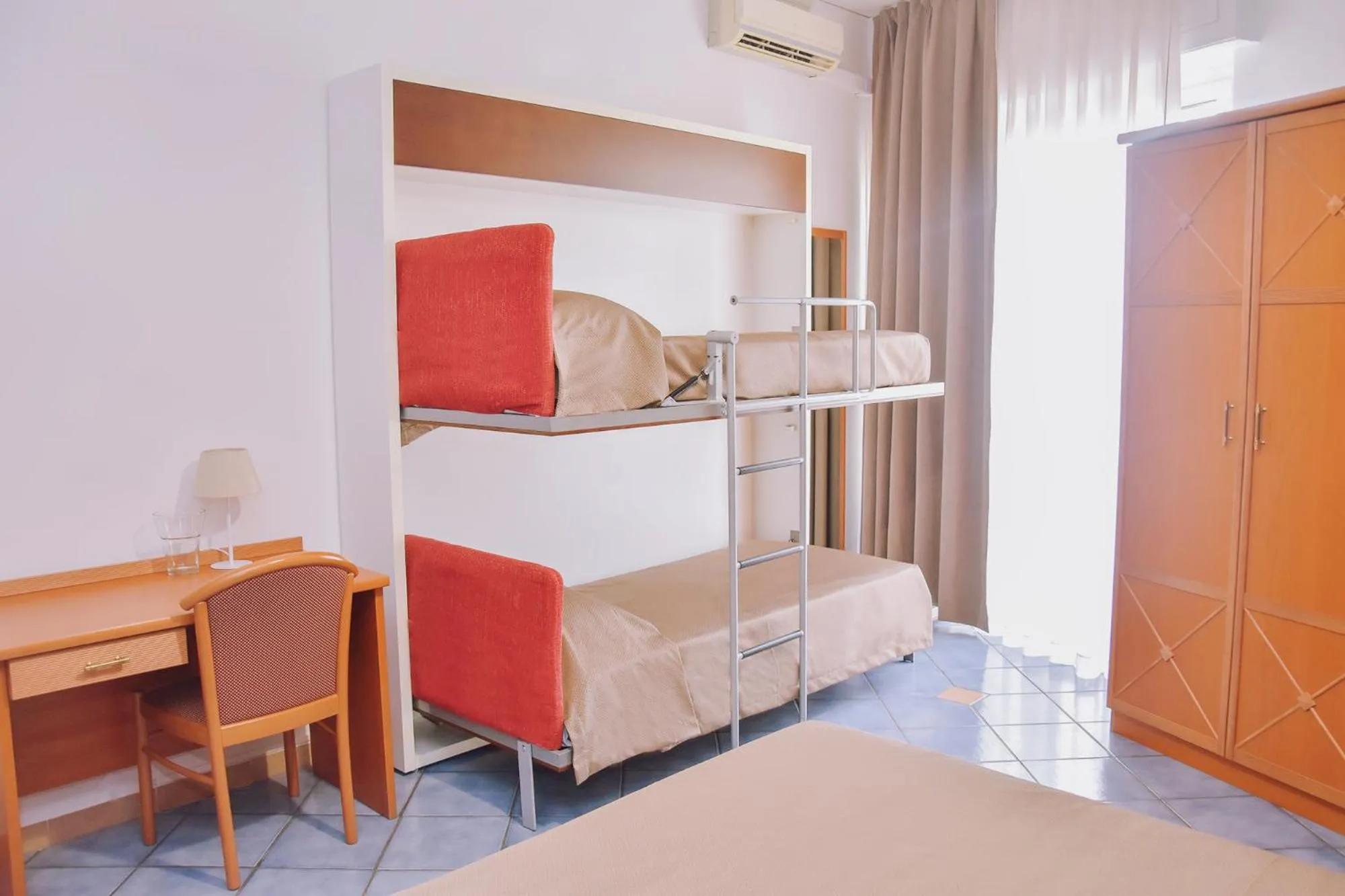 Bed in Hotel Piccolo Sogno