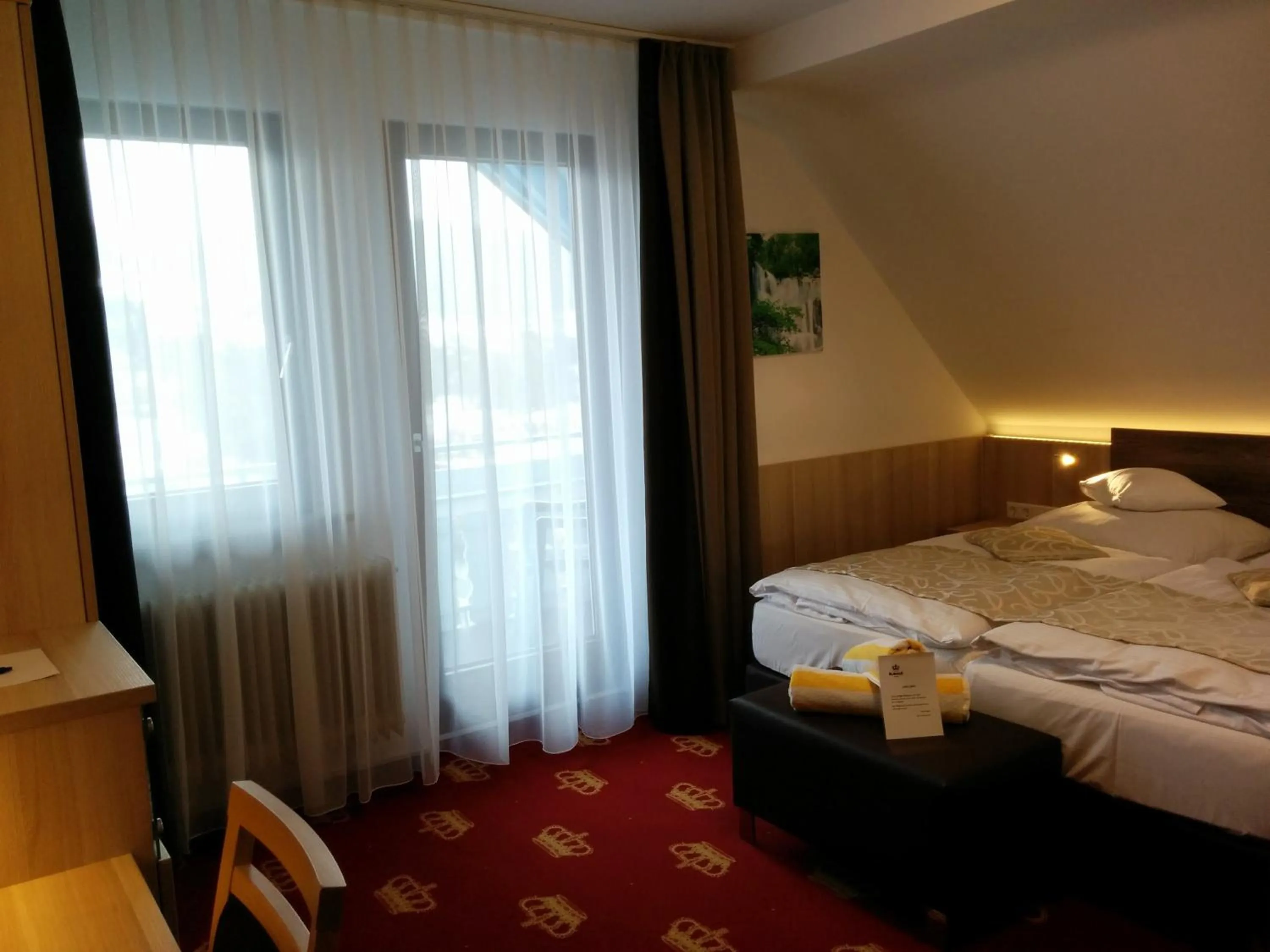 Photo of the whole room, Bed in Wellness Hotel Garni Krone