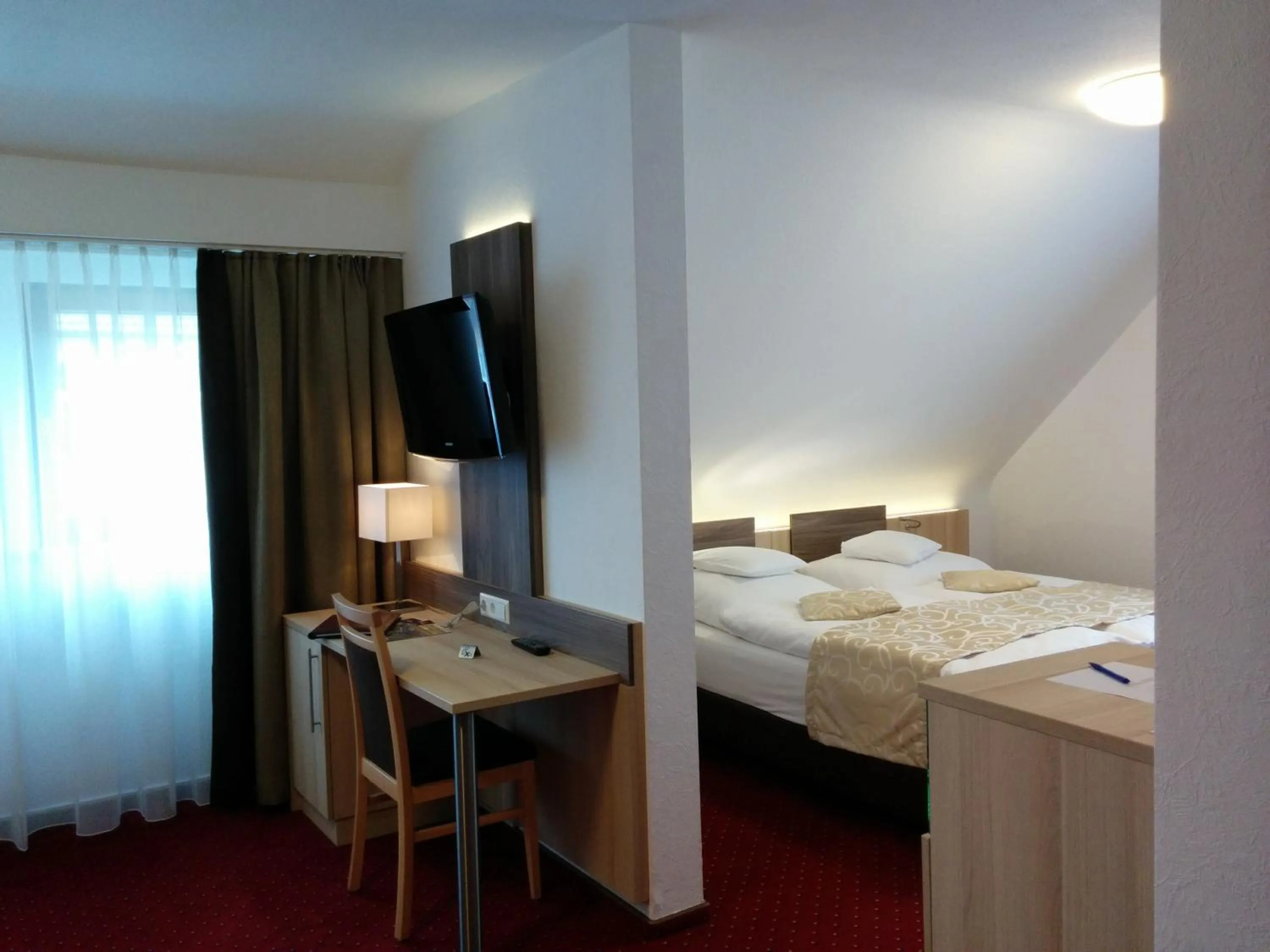 Photo of the whole room, Bed in Wellness Hotel Garni Krone