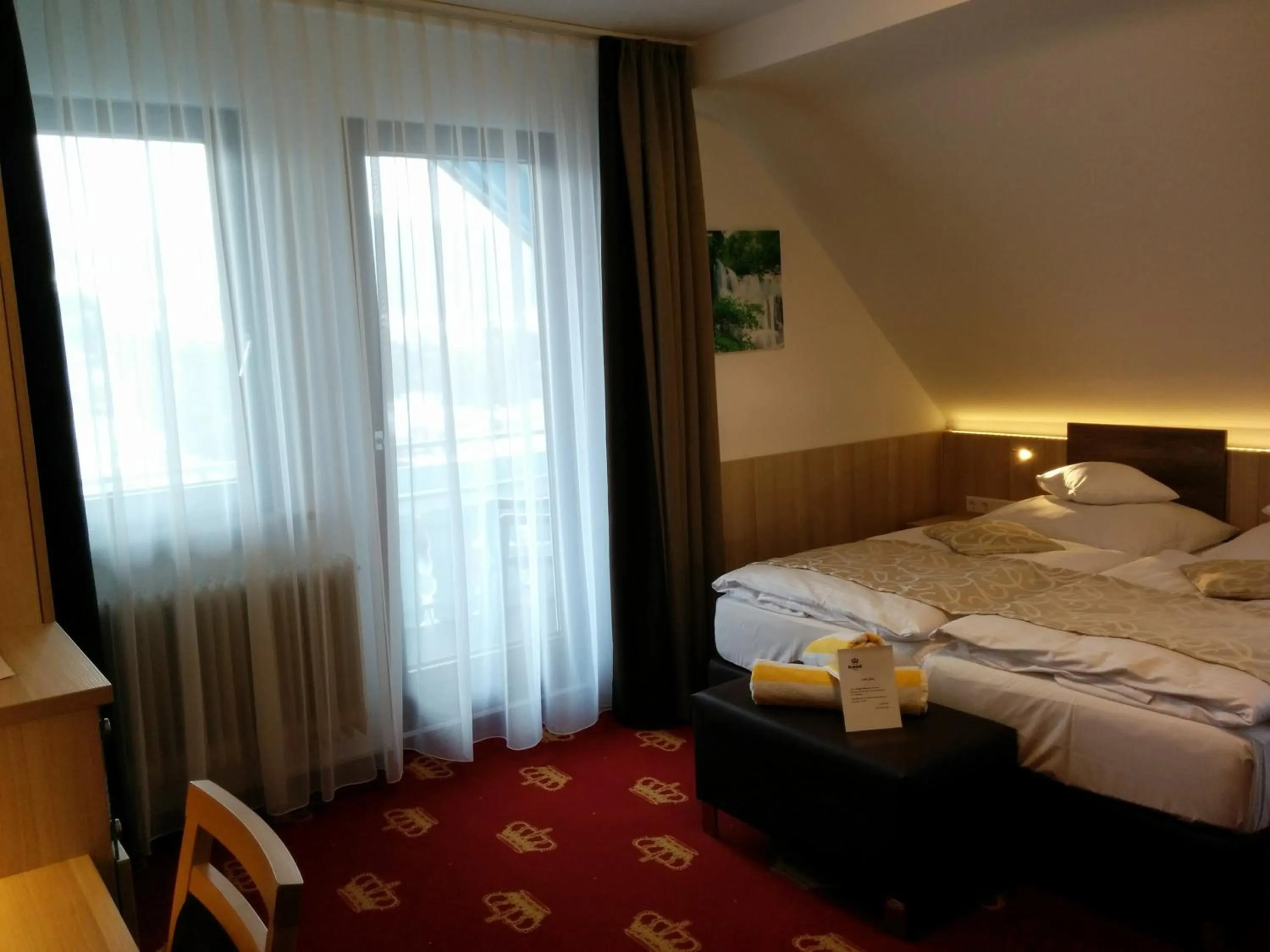 Photo of the whole room, Bed in Wellness Hotel Garni Krone