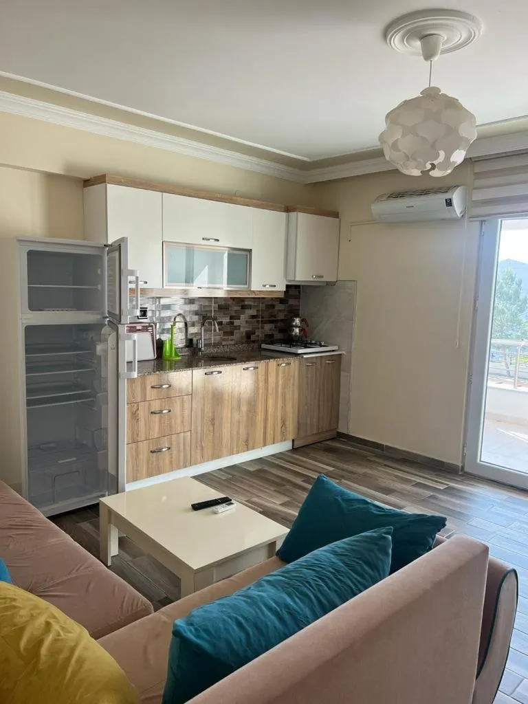 Kitchen or kitchenette in çırpan apart otel