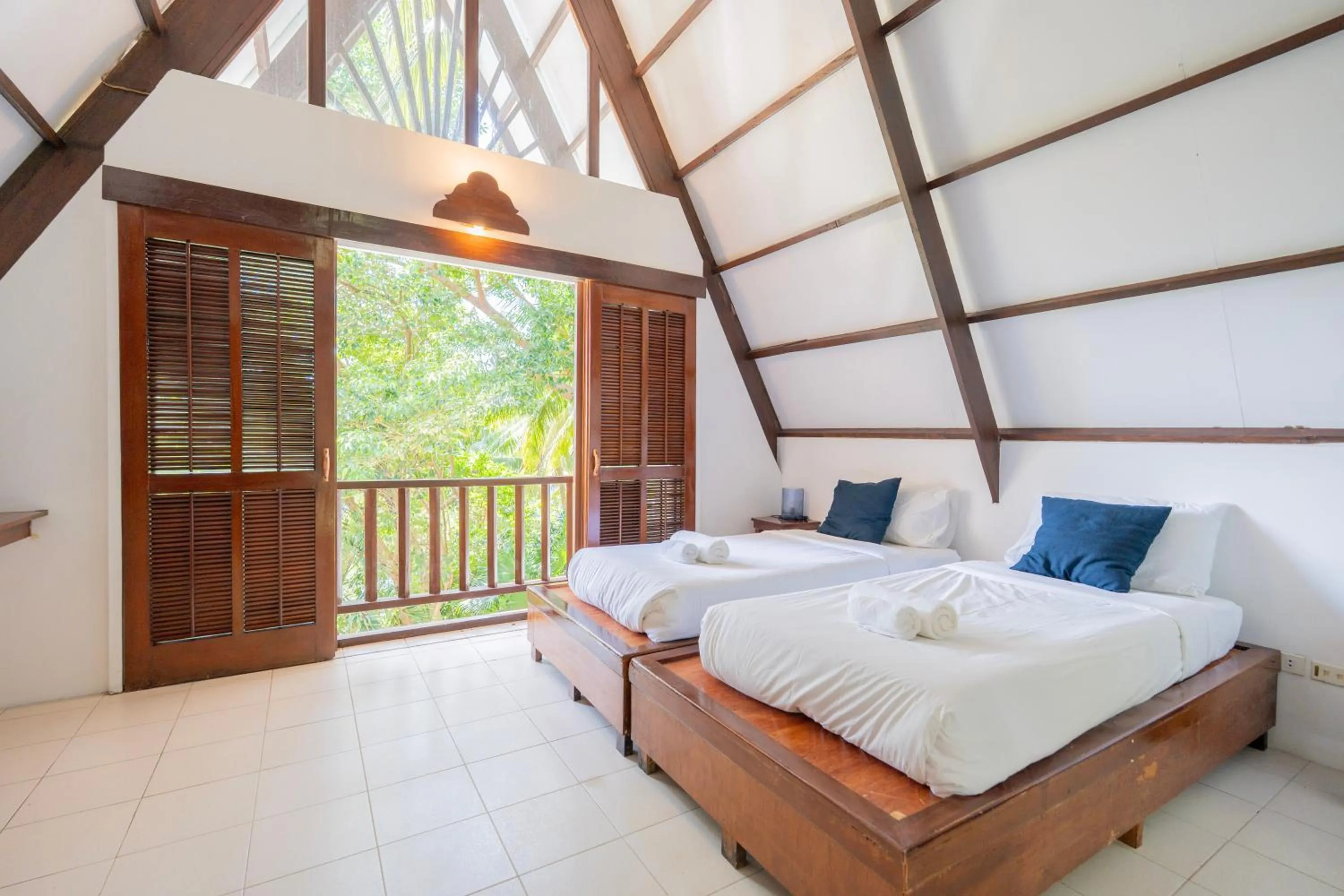 Bed in Casalay Boutique Villas & Dive