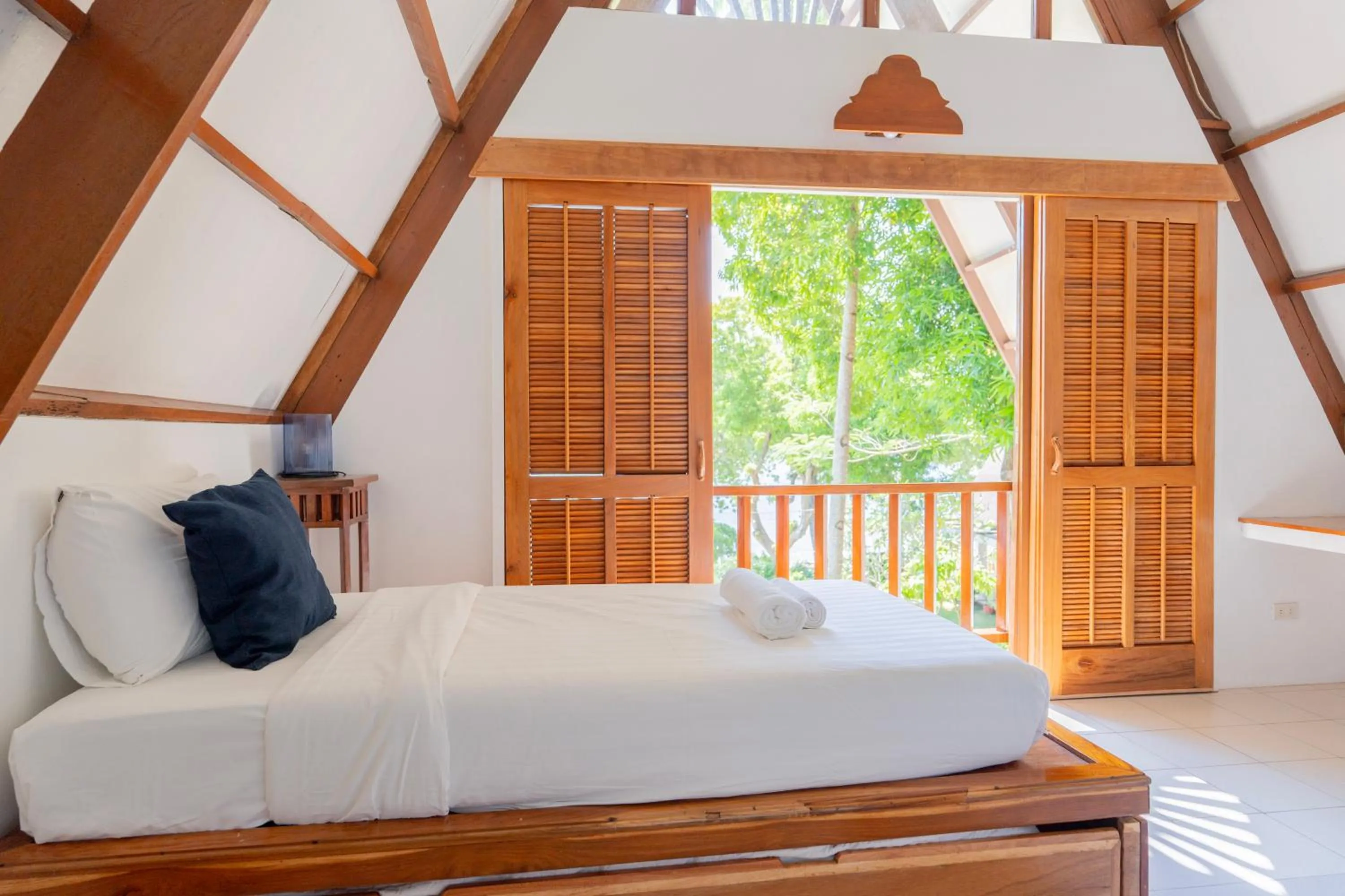 Bed in Casalay Boutique Villas & Dive