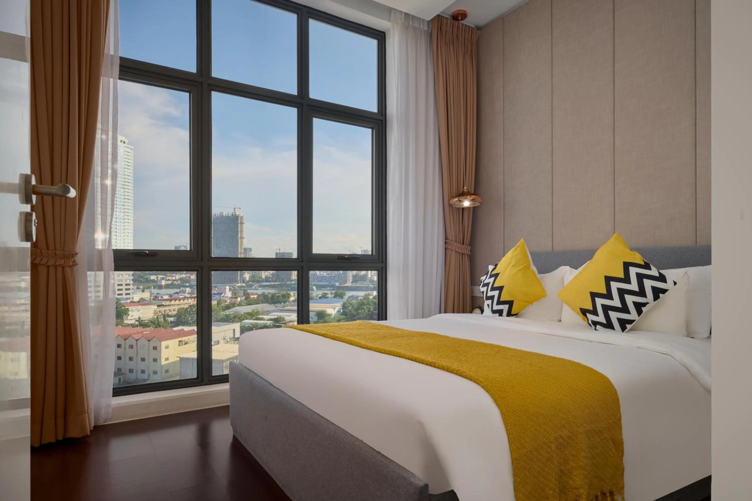 Bed in The Peninsula Phnom Penh