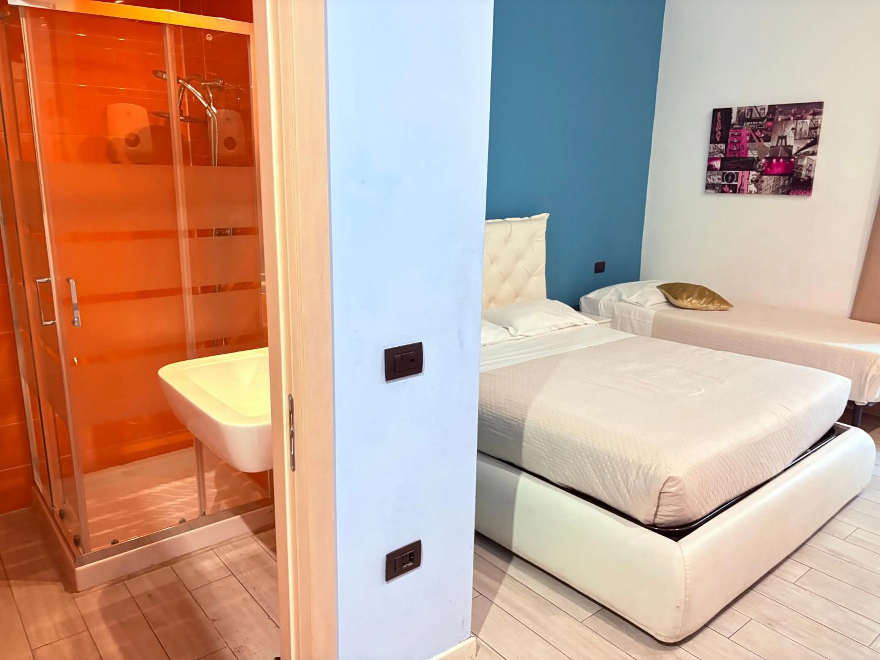 Bed in Blue Shades Hotel