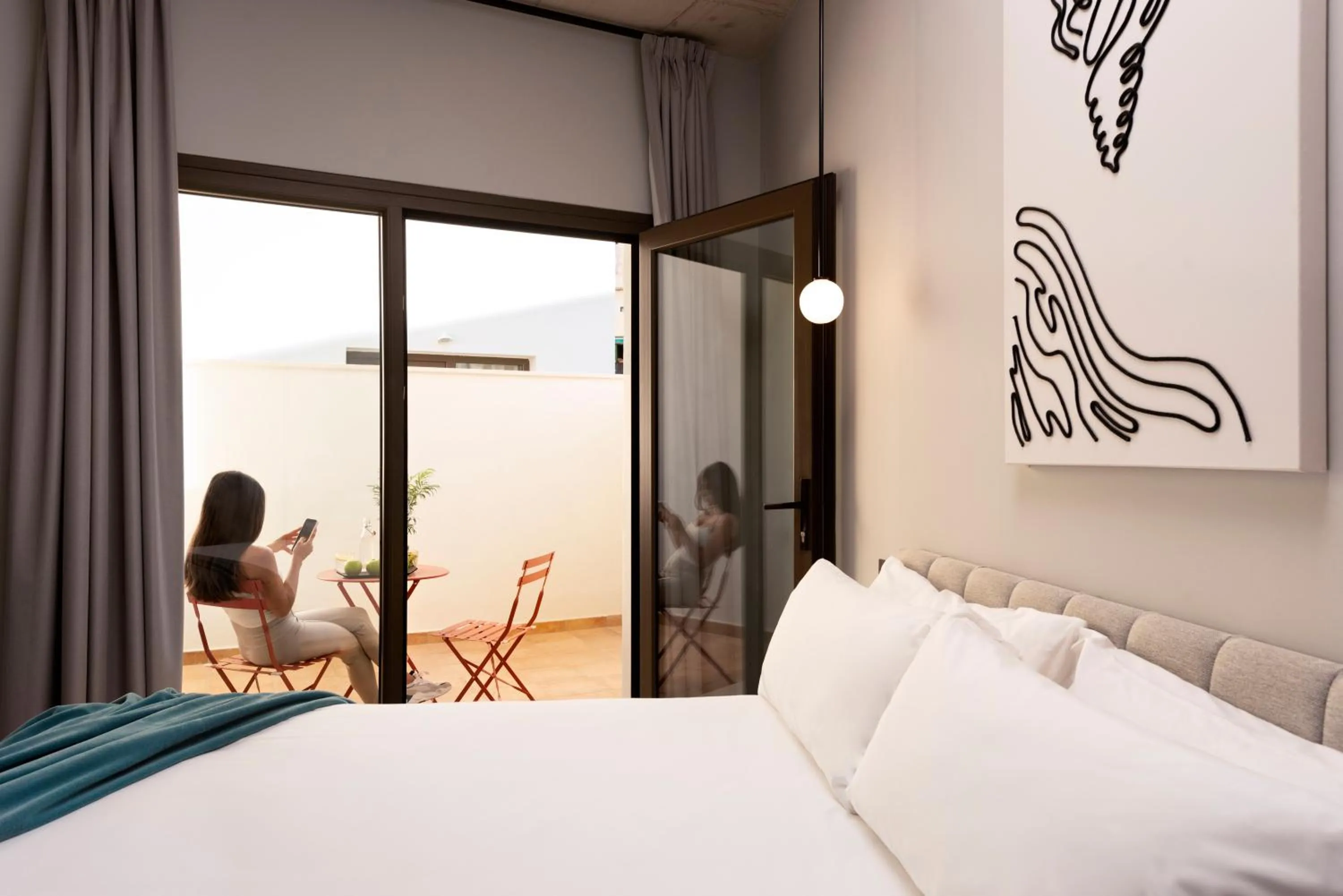 Bedroom, Bed in Coeo Parras Design Apartments