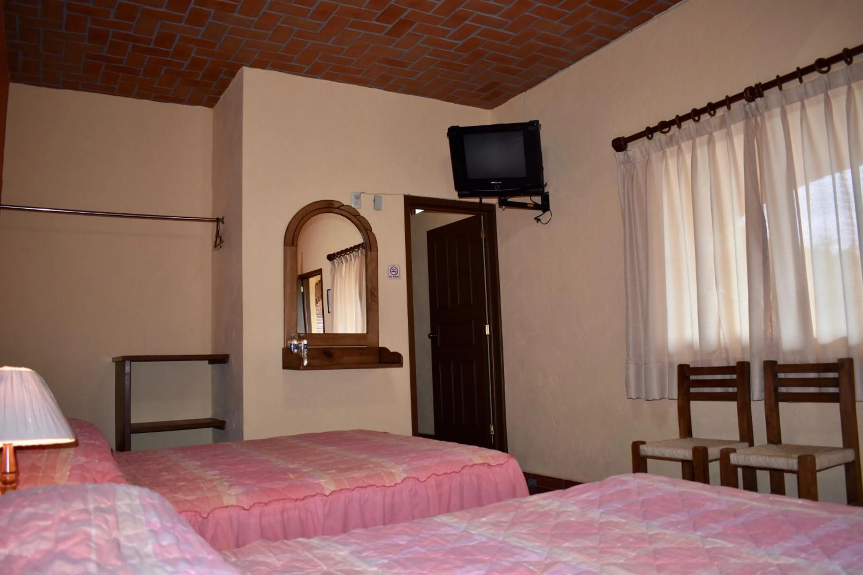 Photo of the whole room, Bed in Posada Rincon Magico