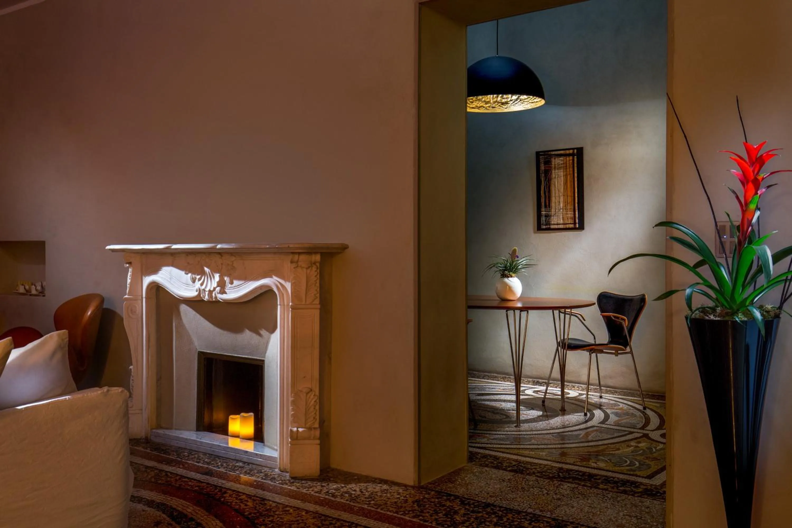 Seating area in SuiteSistina for Brave Lovers