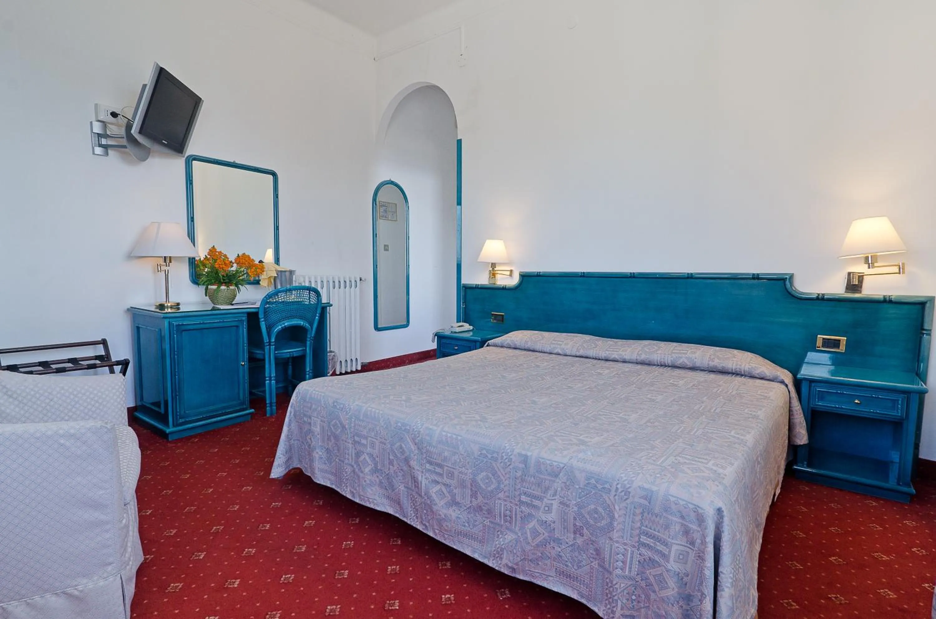 Bed in Hotel Ariston Montecarlo