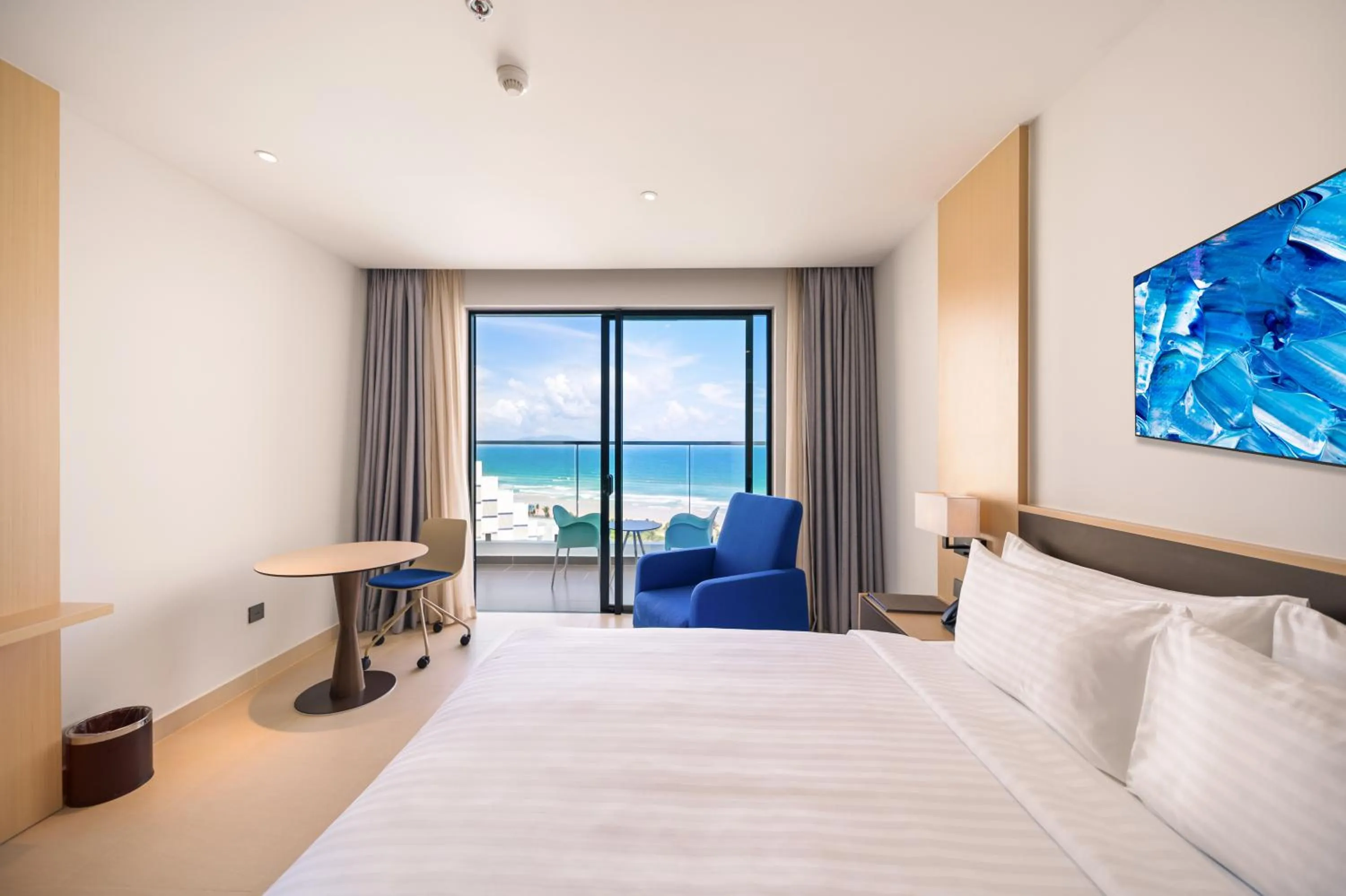 Sea view, Bed in The Empyrean Cam Ranh Beach Resort